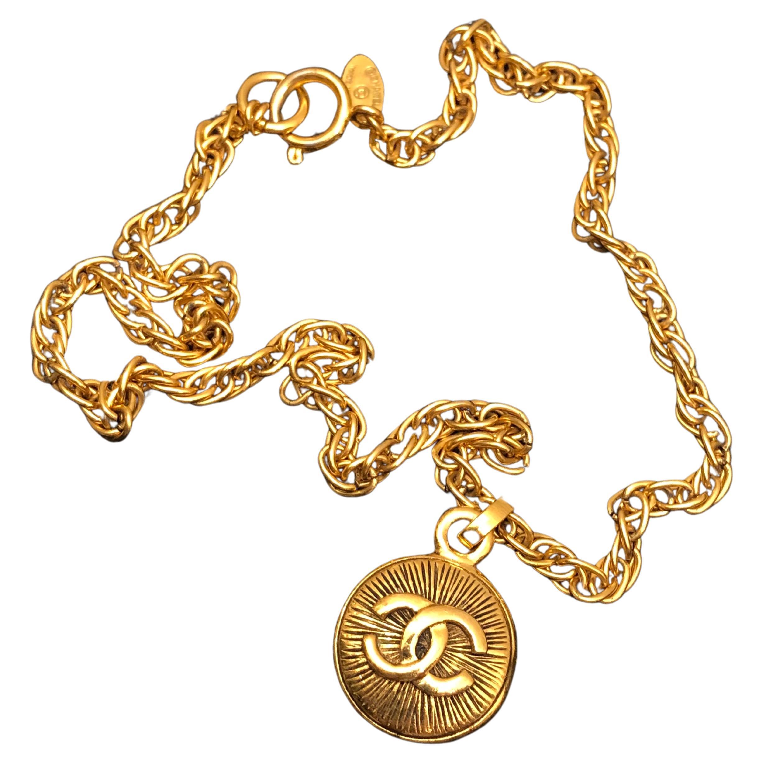 1980s Vintage CHANEL Gold Toned Double Sided CC Charm Short Chain Necklace For Sale