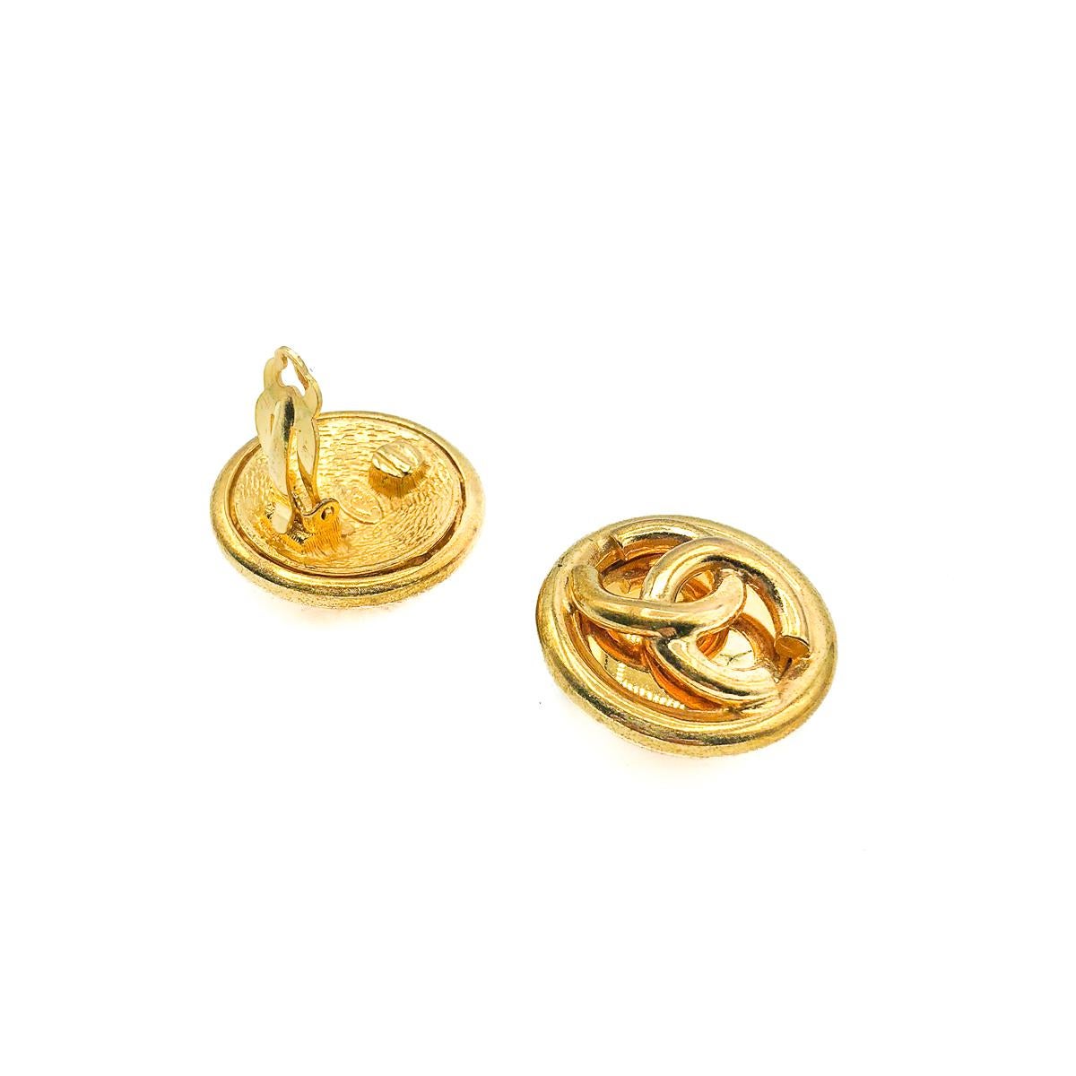 A stunning pair of large clip on Vintage Chanel CC Earrings. Crafted from gold plated metal. Featuring a luxurious tubular style design with the iconic CC logo as the main event. In very good vintage condition, signed and dated to the 1993 Spring