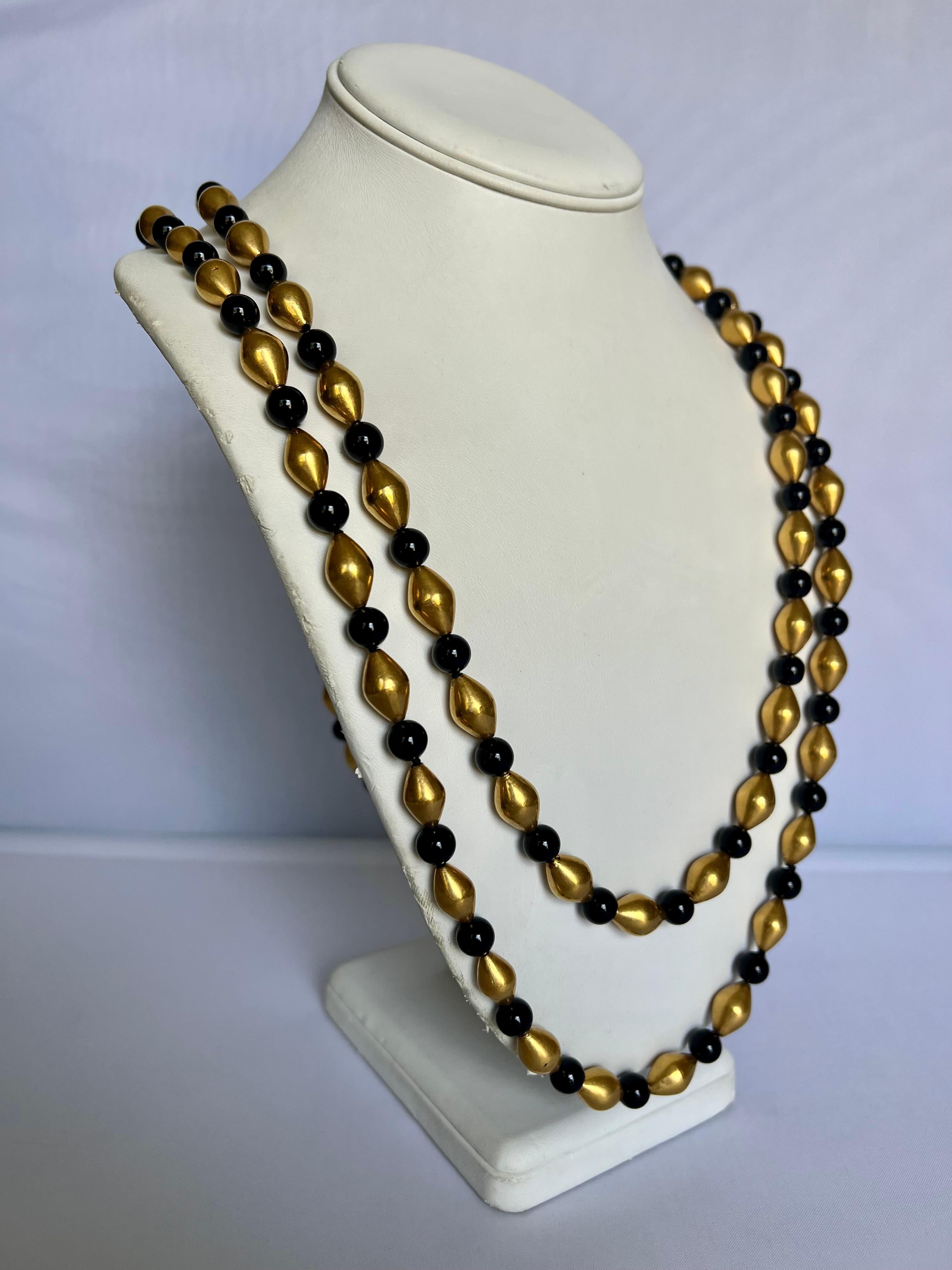 Pair of vintage Chanel beaded sautoir necklaces - comprised of gilt metal angular beads and black 