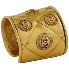 Vintage CHANEL Iconic Quilted Logo Coin Cuff Bracelet