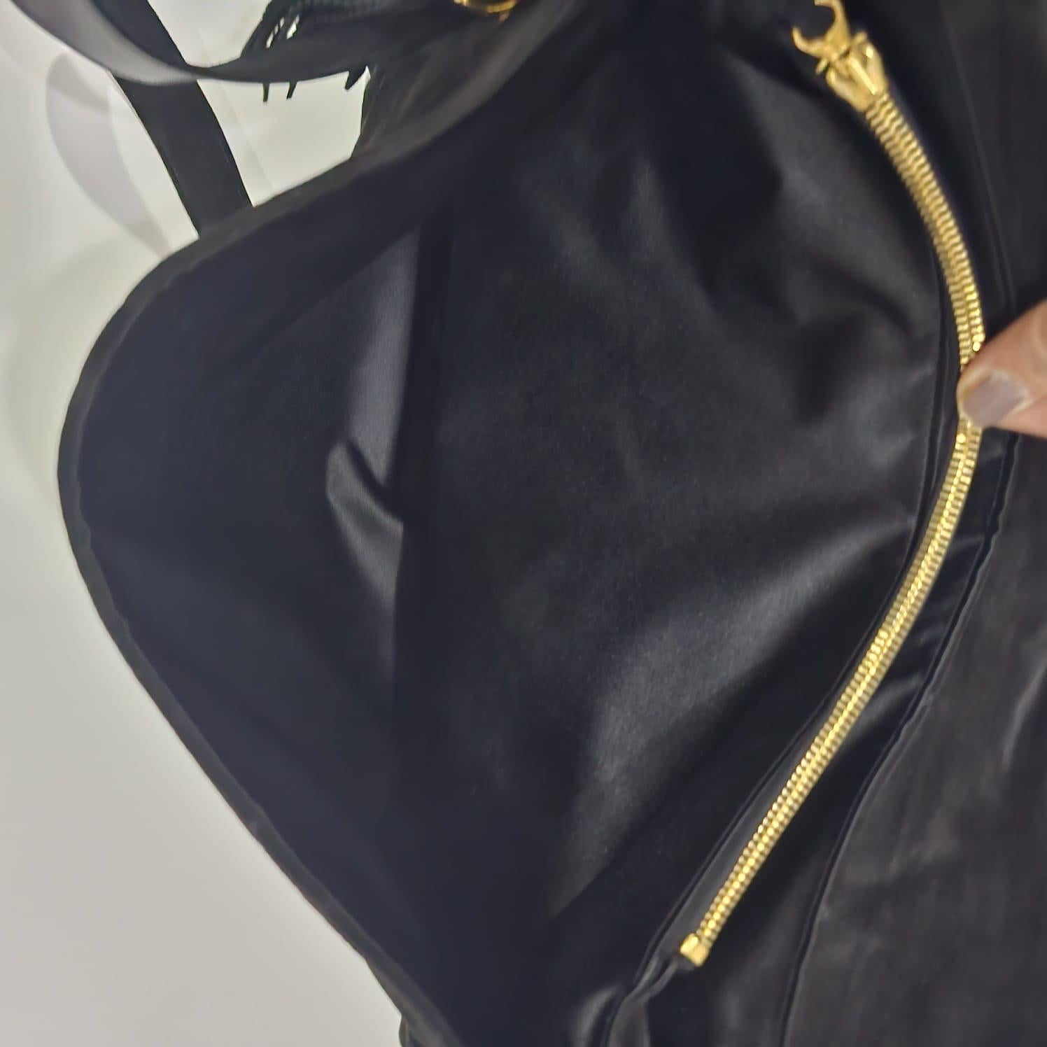 Vintage Chanel Large Black Suede Quilted Messenger Bag with Tassel Details In Good Condition In Jakarta, Daerah Khusus Ibukota Jakarta