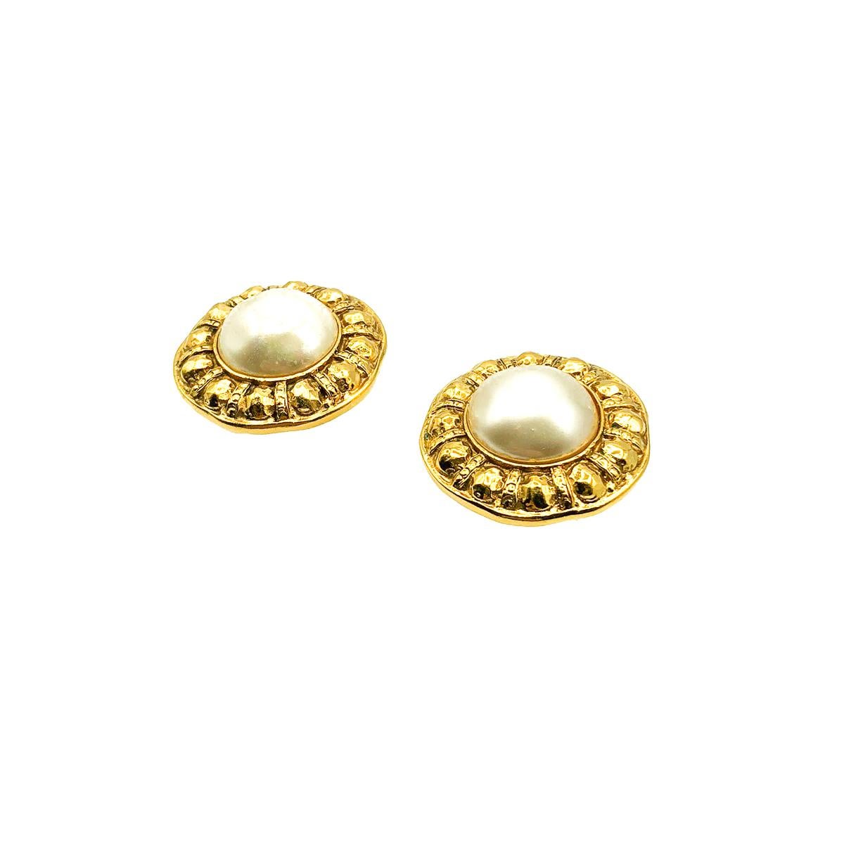 A beautiful statement pair of Vintage Chanel Etruscan Pearl Earrings from the golden era of the 1980s and celebrating one of the most iconic codes of the House; pearls. Crafted in gold plated metal with large sumptuous poured glass or pate de verre