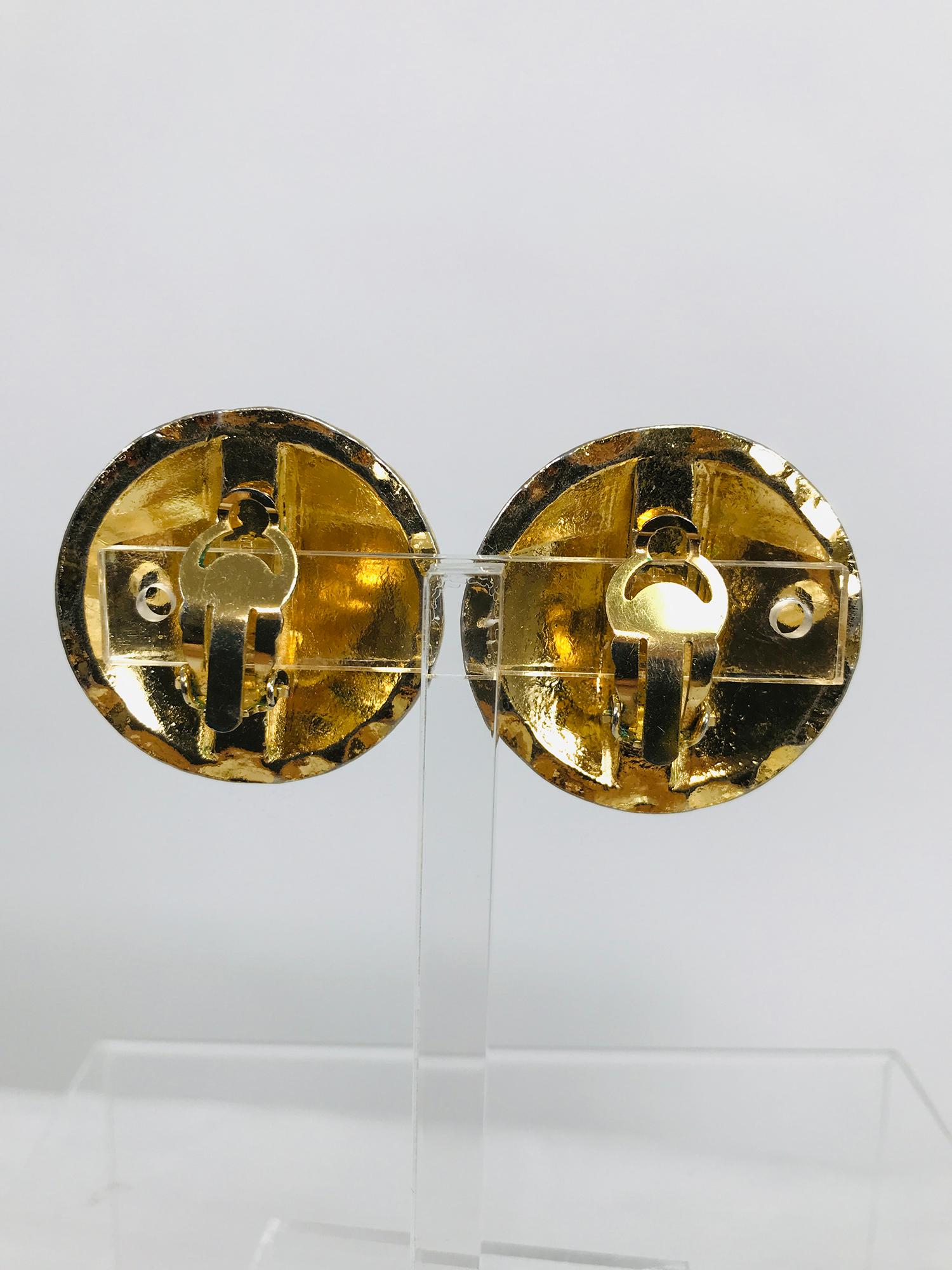 Vintage Chanel Large Round Goldtone Quilted Logo Clip Back Earrings 1960s In Excellent Condition In West Palm Beach, FL