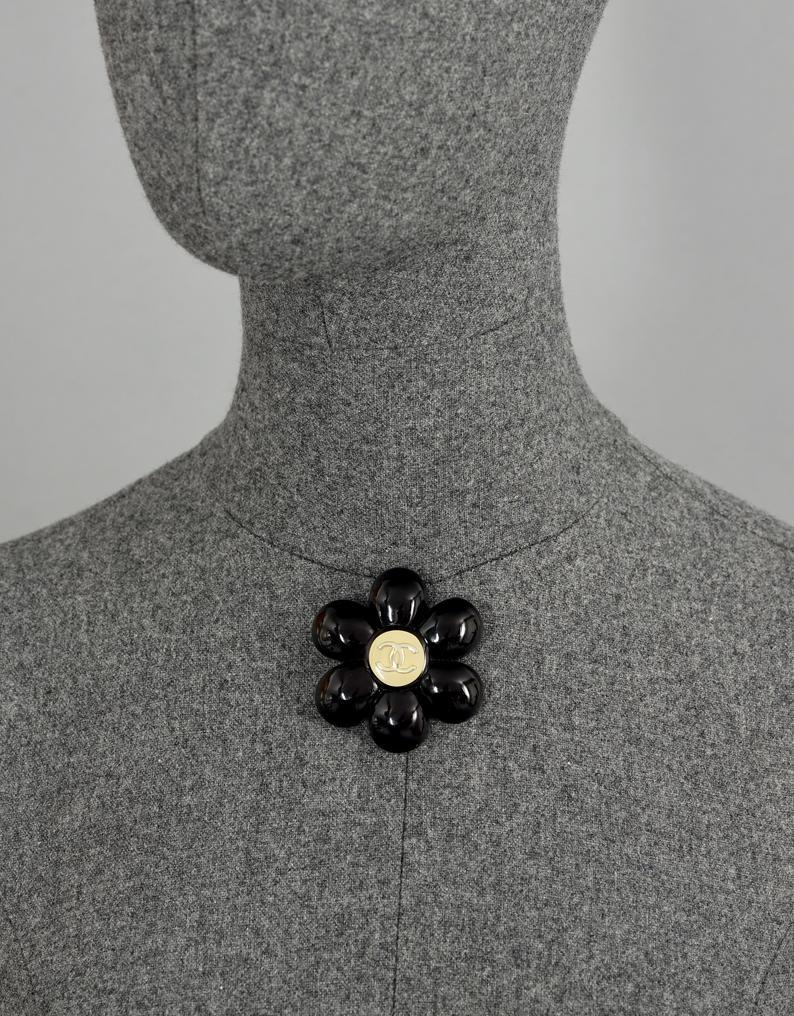 Women's or Men's Vintage CHANEL Logo Black Camellia Resin Brooch