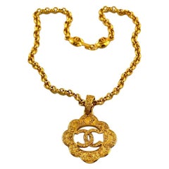 chanel logo cut out Vintage CHANEL Logo Cutout Flower Necklace