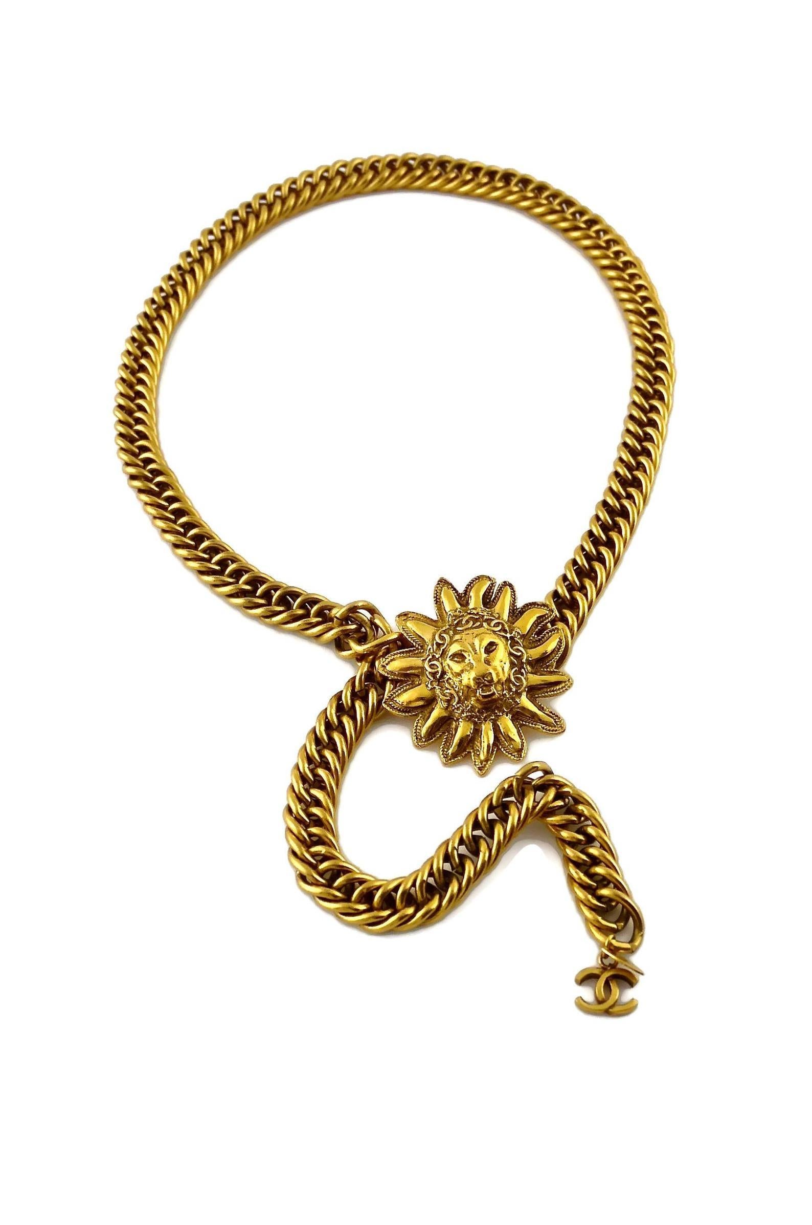 Vintage CHANEL Logo Sun Lion Head Medallion Necklace Belt

Measurements:
Lion Medallions: 1.89 inches (4.8 cm)
Wearable Length: 28.34 inches (72 cm)

Features:
- 100% Authentic CHANEL.
- 3 dimensional lion sun medallion charm.
- Chanel CC logos