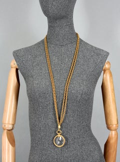 Collier vintage CHANEL Logo Torsade en verre grossissant avec chaîne ultra longue avec logo