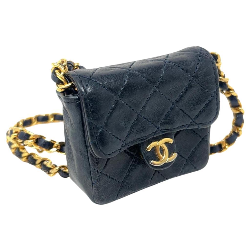 
Vintage Rare Chanel Black Micro Mini Gold Hardware, 1990 collection handbag.
Chanel box complimentary not the original one.

Condition: Good Vintage Condition. This previously owned and used item is in good condition with visible signs of use. This