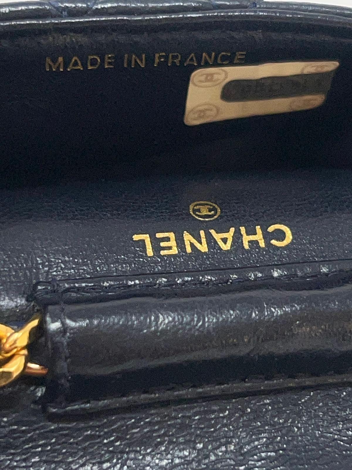 Women's or Men's Vintage Chanel Micro Mini Lambskin Leather GHW 1990 Collection