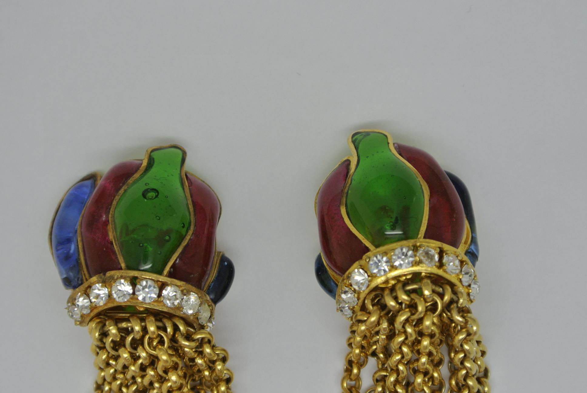 Pair of Chanel earrings, dated 1970s. 
Comes with red, green and blue glass. 
signed, very hard to find design

