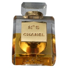 Vintage CHANEL Miniature Perfume Bottle Pin Brooch at 1stDibs | vintage chanel perfume bottle, chanel perfume bottle brooch, vintage chanel no 5 perfume bottle