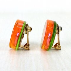 Vintage CHANEL orange aurora earrings with Chanel iconic motif charms.