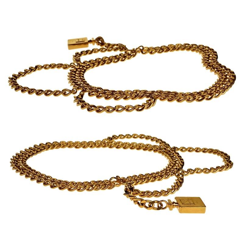 Vintage CHANEL Perfume Bottle Charm Tiered Chain Necklace Belt

Measurements:
Perfume Charm: 1.53 inches (3.9 cm)
Wearable Length: 26.37 inches (67 cm) 

Features:
- 100% Authentic CHANEL.
- Perfume bottle charm with engraved 