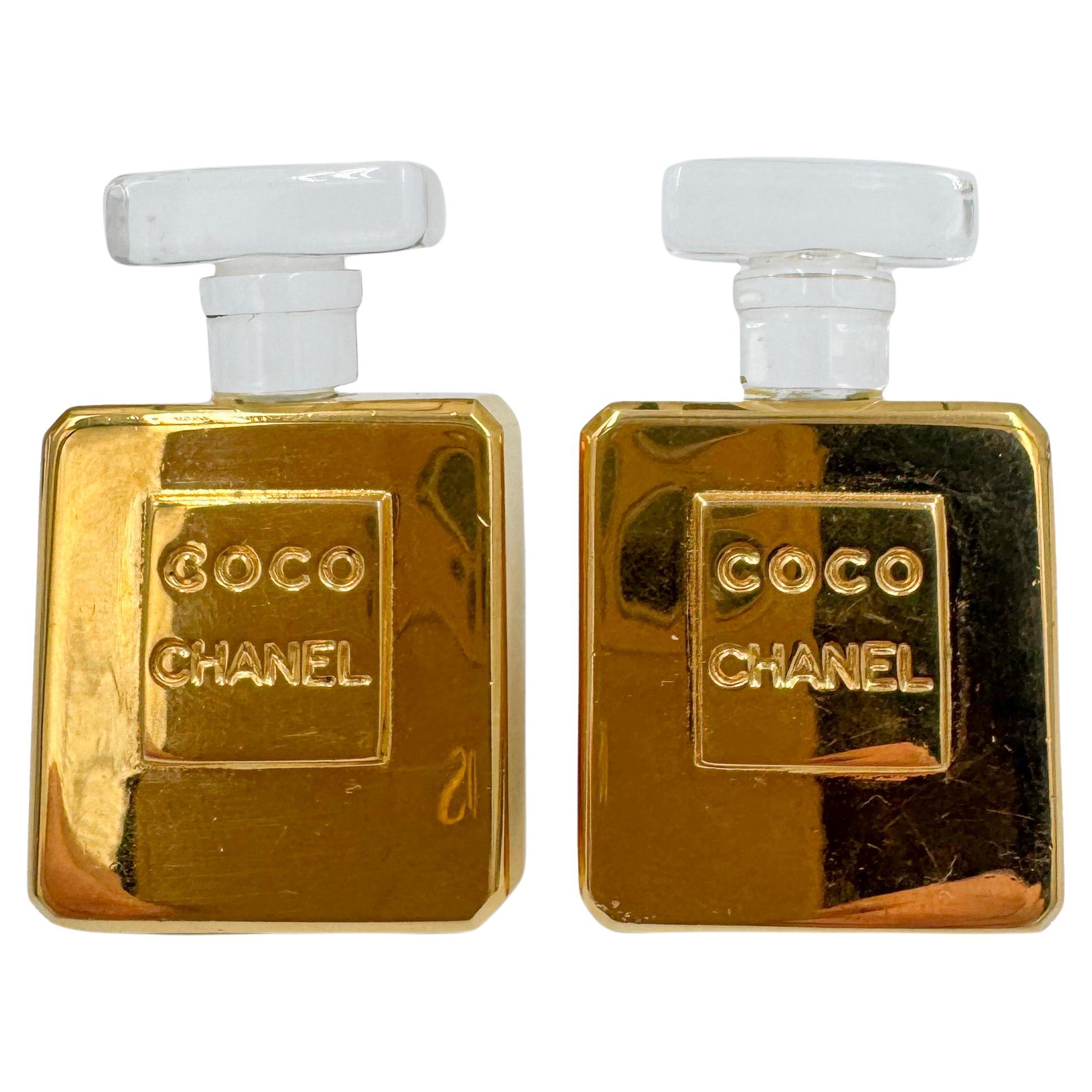 Chanel Vintage  Boucles d'oreilles clips en plaqué or avec bouteille de parfum
