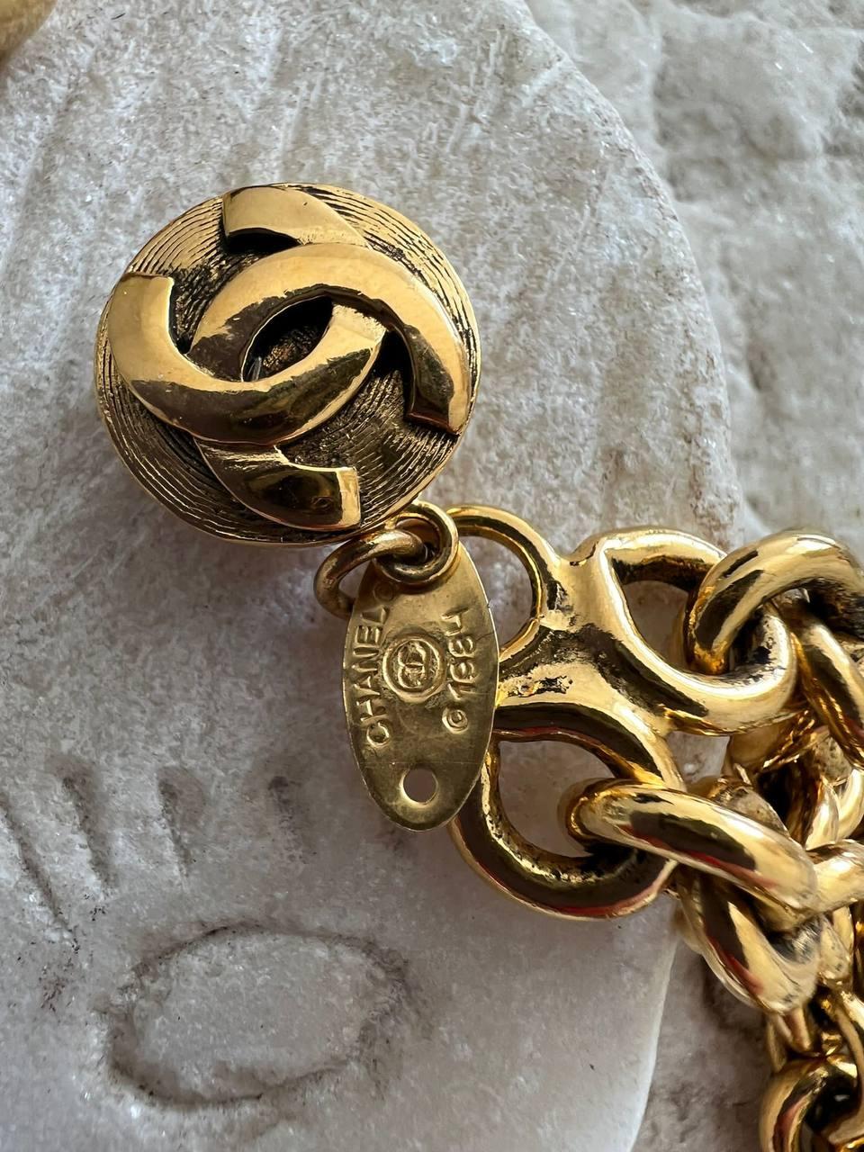 Vintage multi-strand necklace by Maison Goossens for Chanel. The necklace is made from gold plated metal and features two Medallions with embossed images of Sagittarius. 
Year: 1984 
Condition: good, slightly tarnished. 

........Additional
