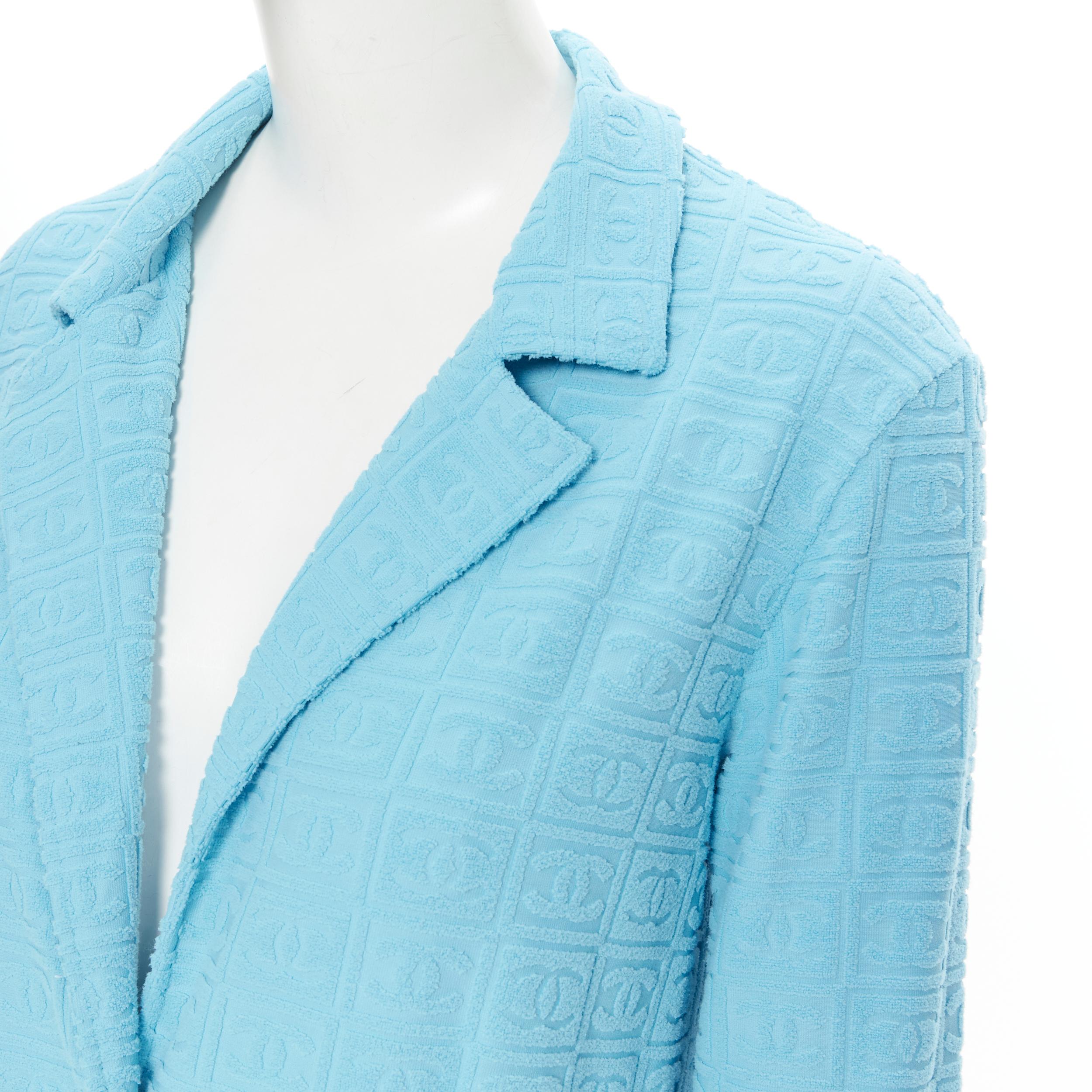 vintage CHANEL Sport 2002 blue CC emboss jacquard terry towel blazer jacket FR40 
Reference: GIYG/A00067 
Brand: Chanel 
Designer: Karl Lagerfeld 
Material: Polyester 
Color: Blue 
Pattern: Solid 
Closure: Button 
Extra Detail: Signature CC