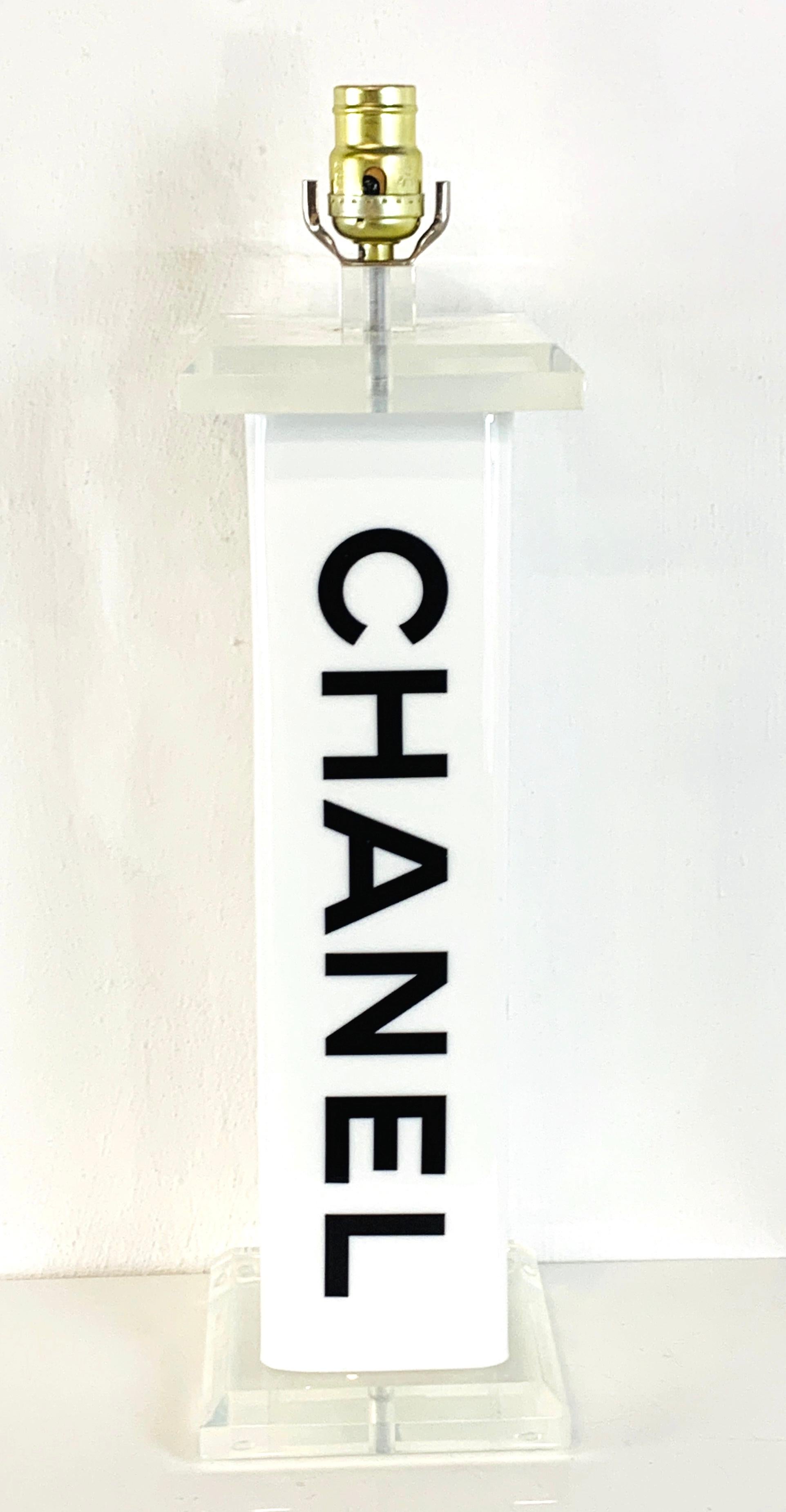 Vintage Chanel store display Lucite lamp, a unique one of kind vintage Chanel store fixture. Marked 