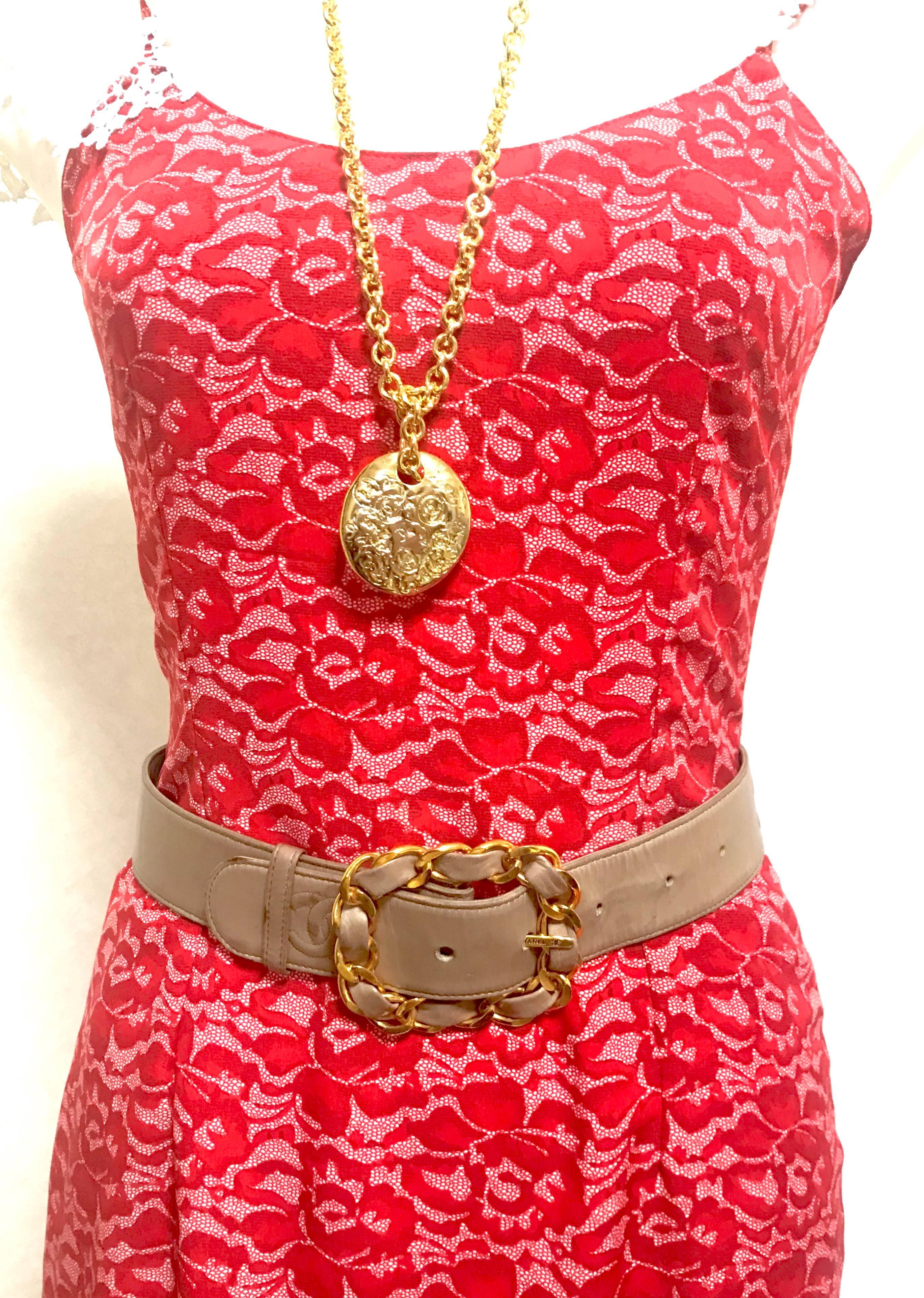 1990s. Vintage CHANEL taupe, cocoa brown color thick leather belt with gold tone chain buckle and CC stitch marks. Size for 24.5