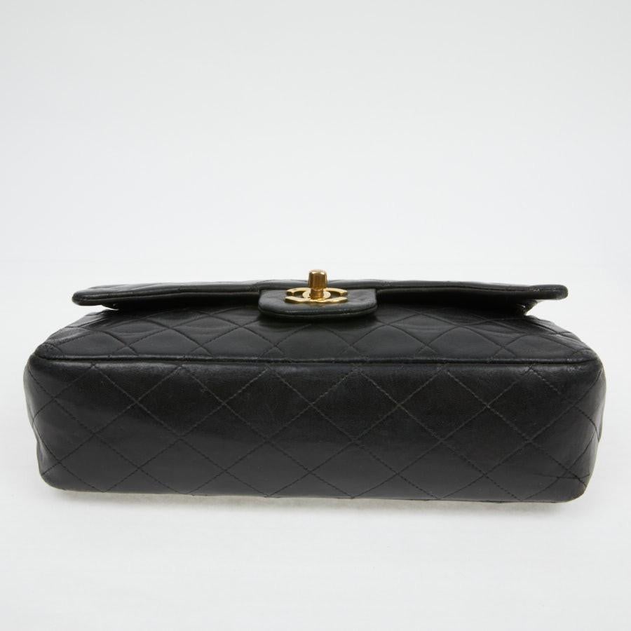 Vintage Chanel Timeless Black Flap Bag In Fair Condition In Paris, FR