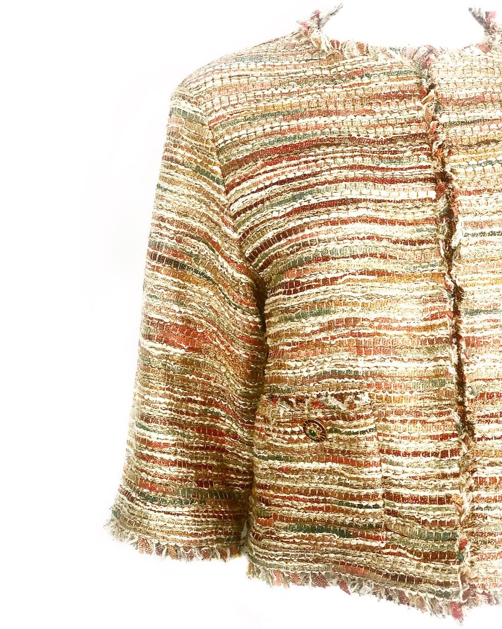 
Vintage CHANEL Tweed Metallic Gold Multi Color Jacket w/ Tags Size 44

Product details:
Size 44
One open pocket on each side with button detail
Four hooks closure inside 
The sleeves are 16.5 inches long 
Shoulder to shoulder measures 17.75 inches 