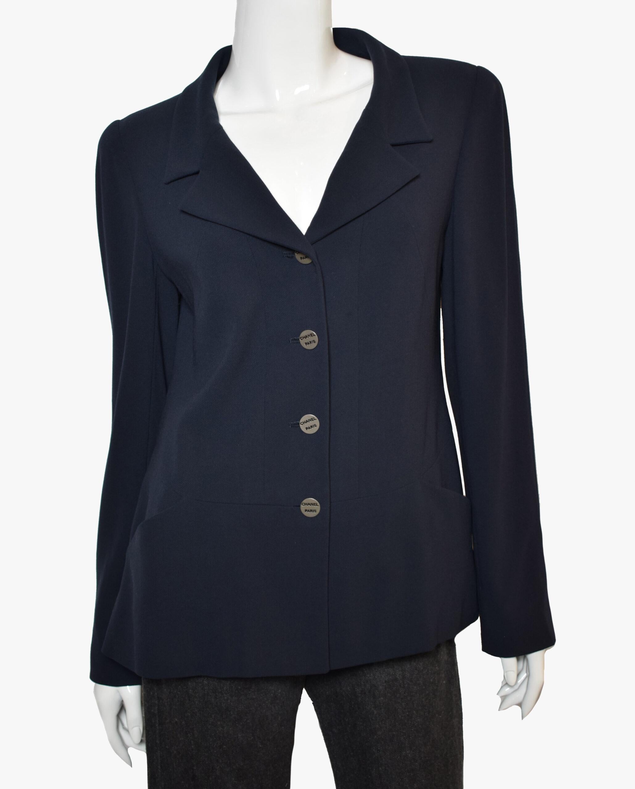 Chanel wool blazer from the Cruise 2000 Collection by Karl Lagerfeld. 
Blue color, Pointed Collar, Slit Pockets & Button Closure

Fabric: 100% Wool; Lining 100% Silk
Size: L / US10, FR42
Bust: 34″/ 86 cm
Waist: 32″/ 81 cm
Shoulder: 15″/ 38cm
Length: