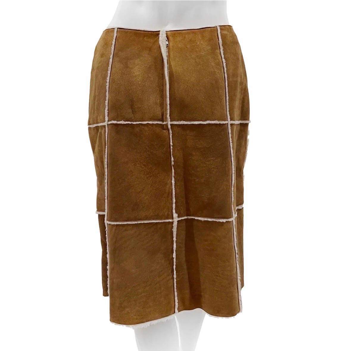 Vintage Wool Shearling Skirt by Chanel
Fall / Winter 2000
Made in France
Tan/cream 
Shearling detail
Mid length skirt
Back zip closure
Fabric Composition; 100% Lamb wool
Excellent  Condition; Preloved with little to no visible wear. (see photos)