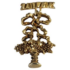 Spilla vintage Chantal Thomass in stile francese a forma di fiocco e cesto di frutta