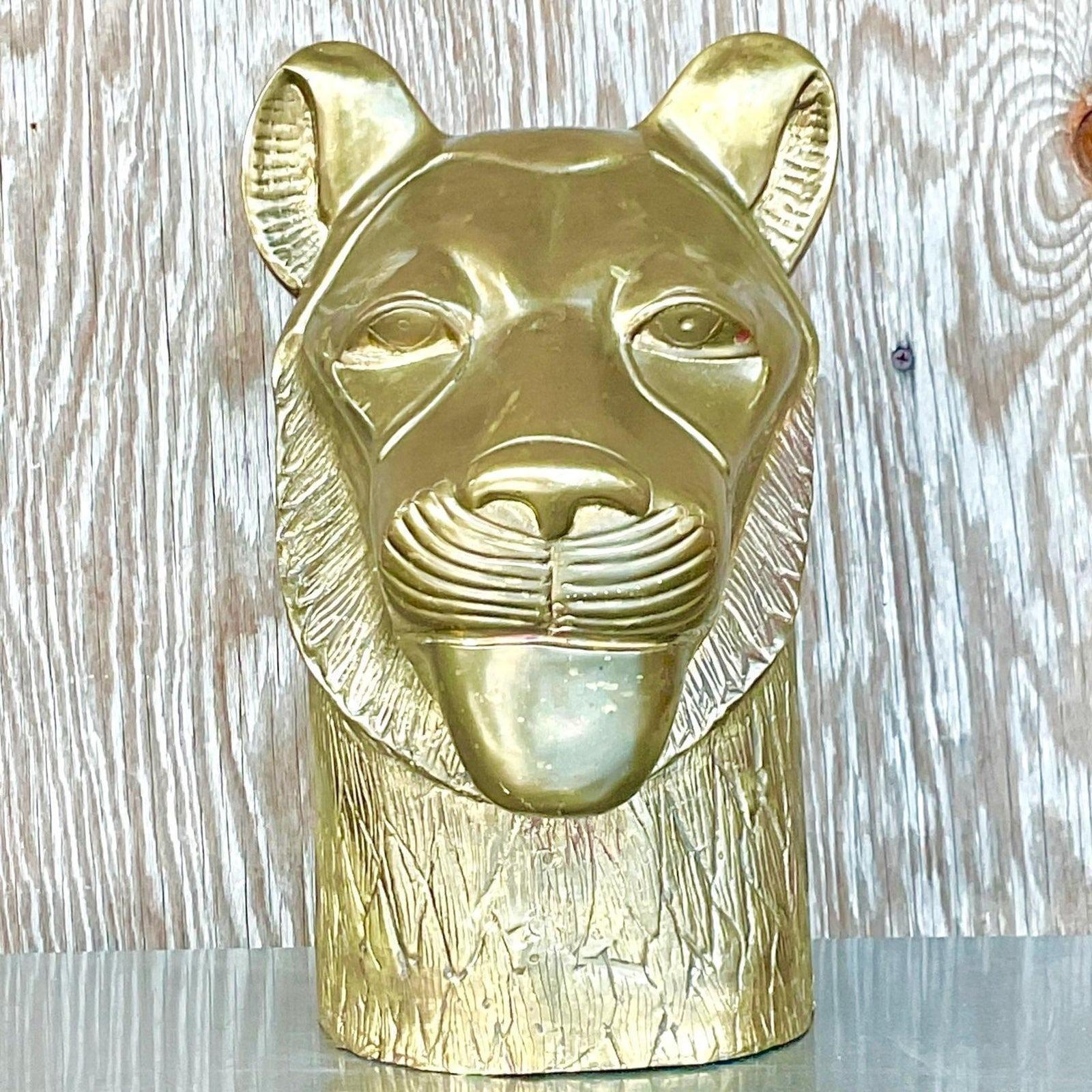A fantastic vintage Boho Lioness sculpture. Made by the iconic Chapman group. A heavy composition in solid brass. Acquired from a Palm Beach estate.