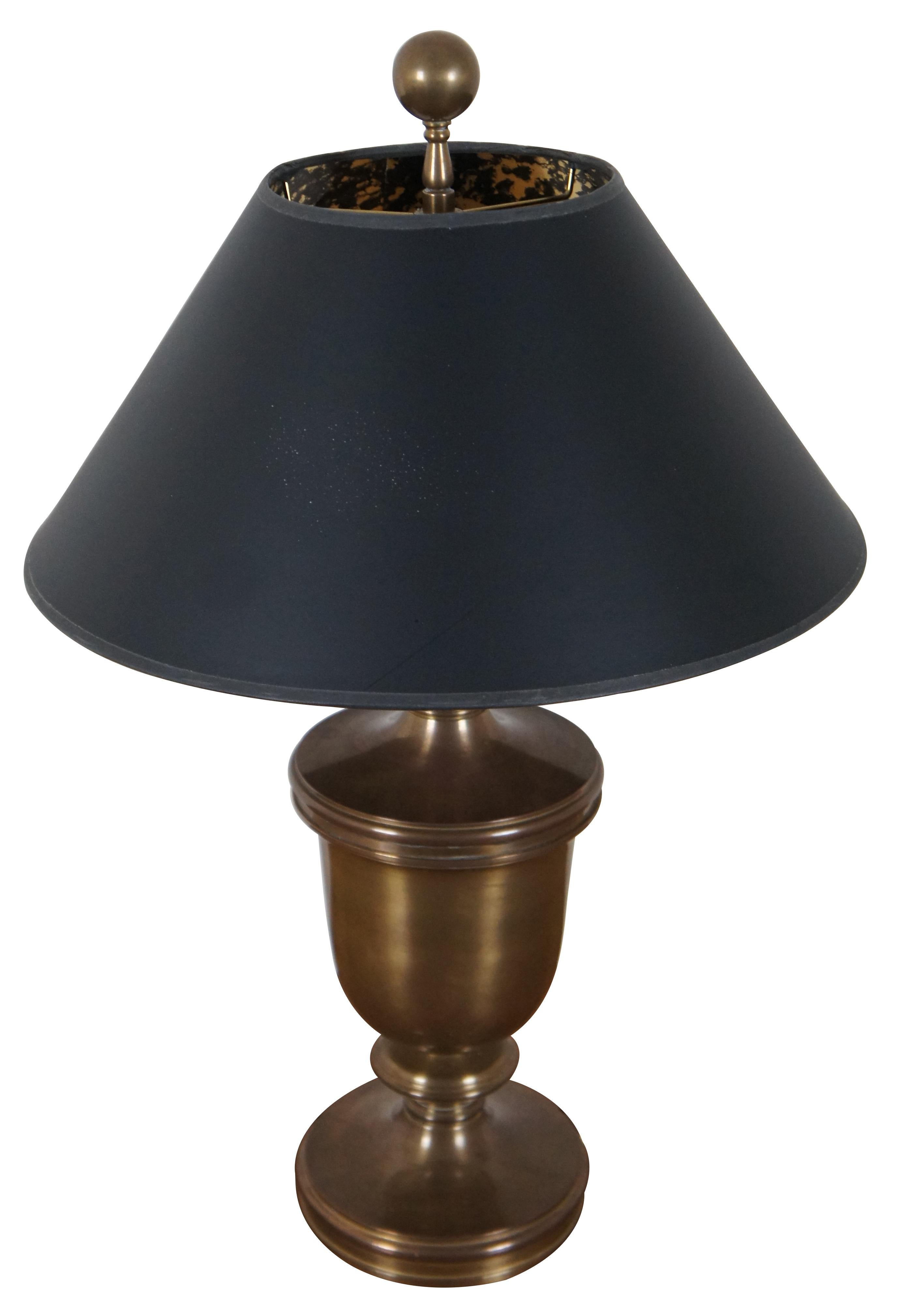 Vintage Chapman Brass classical urn shaped table lamp with two lights, ball shaped finial, and black shade with foil interior.

Measures: 6.25” x 23.25” / Shade - 15” x 8” (Diameter x Height).