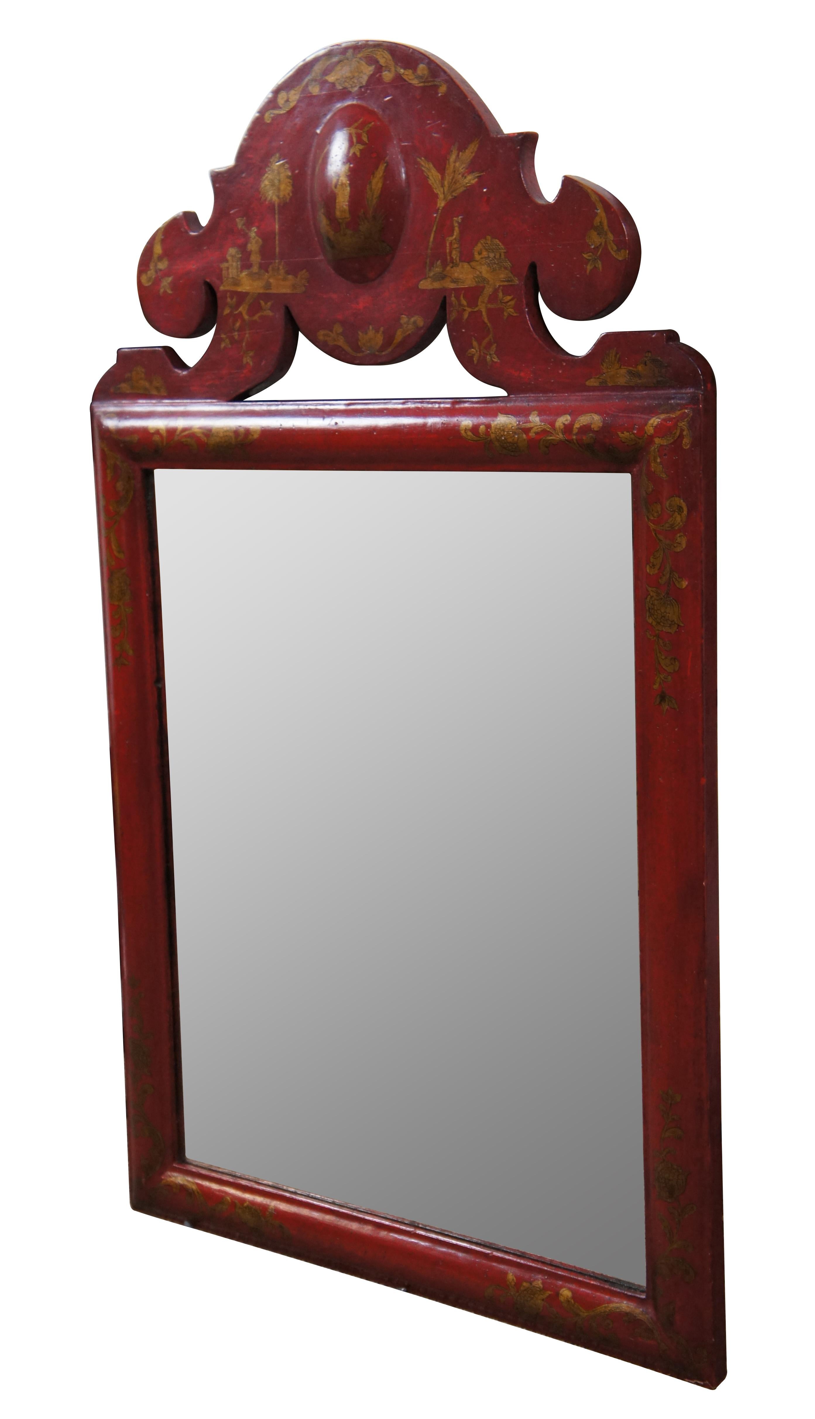 Vintage William & Mary / chinoiserie wall mirror japanned in scarlet with gold painted decoration, rectangular in shape with a pierced arched pediment. Marked Chapman Made in Spain on reverse.

22.5” x 1.25” x 38” / Mirror - 18” x 23.5” (Width x