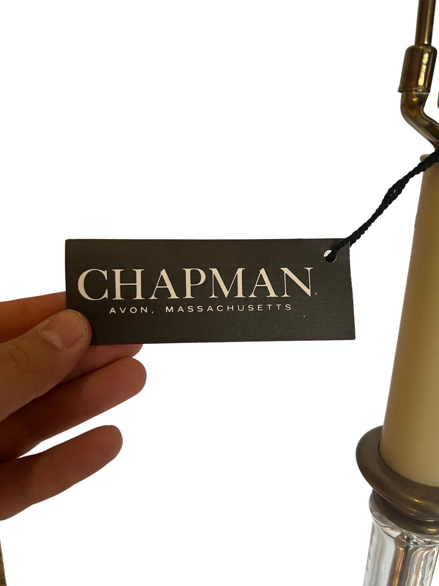 A new old stock vintage chapman lamp in the Regency style. Constructed in brass and glass to visually simulate bamboo. Original tag affixed.
Measures: 37” h to finial
27.5” h to socket.