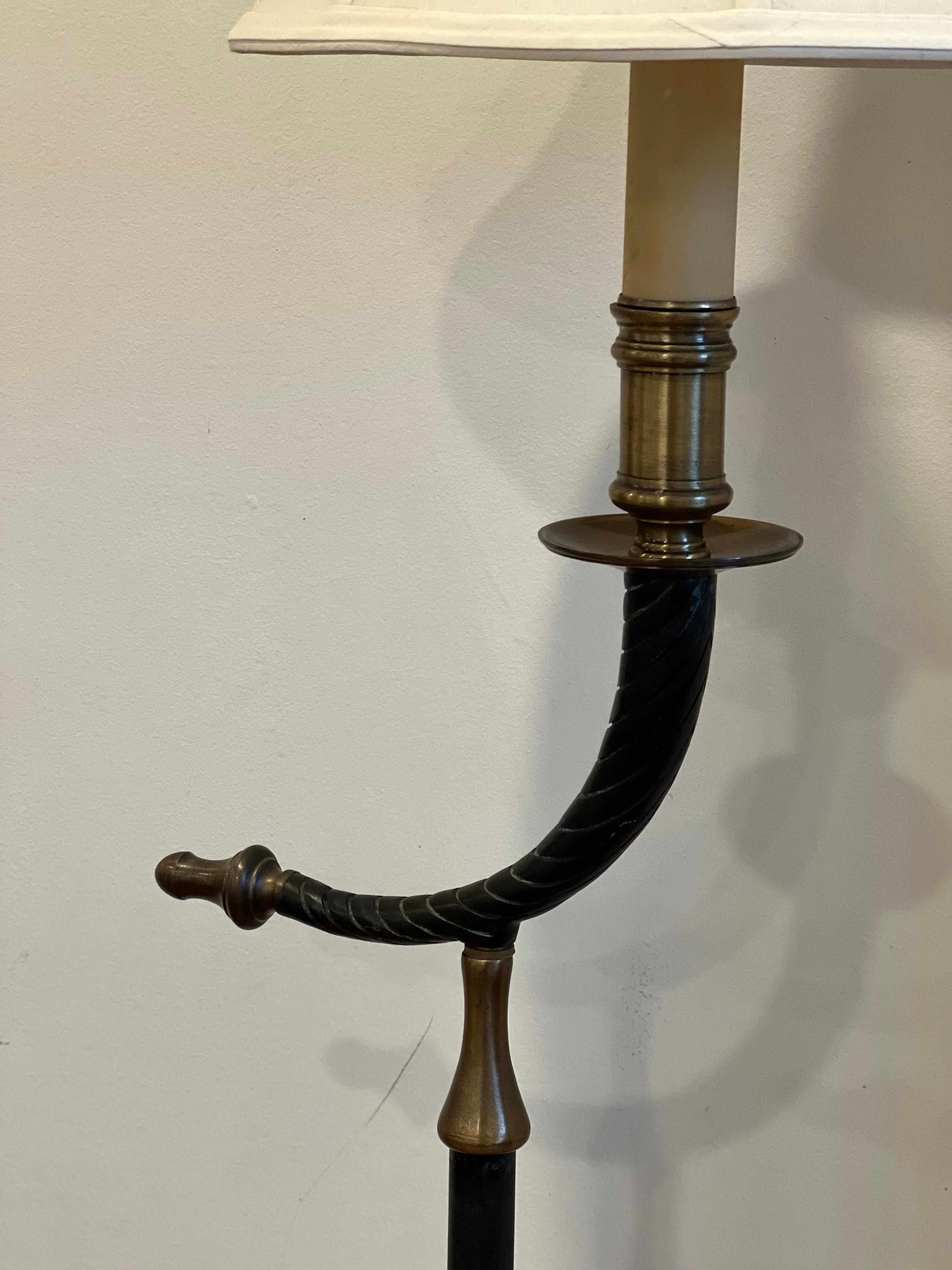 Unique Floor Lamp in Chapman Style.
Bronze and Brass finish. Has a faux twisted horn style along the body. 

Measures: 52.5 Height without harp. 62.5 with current harp.