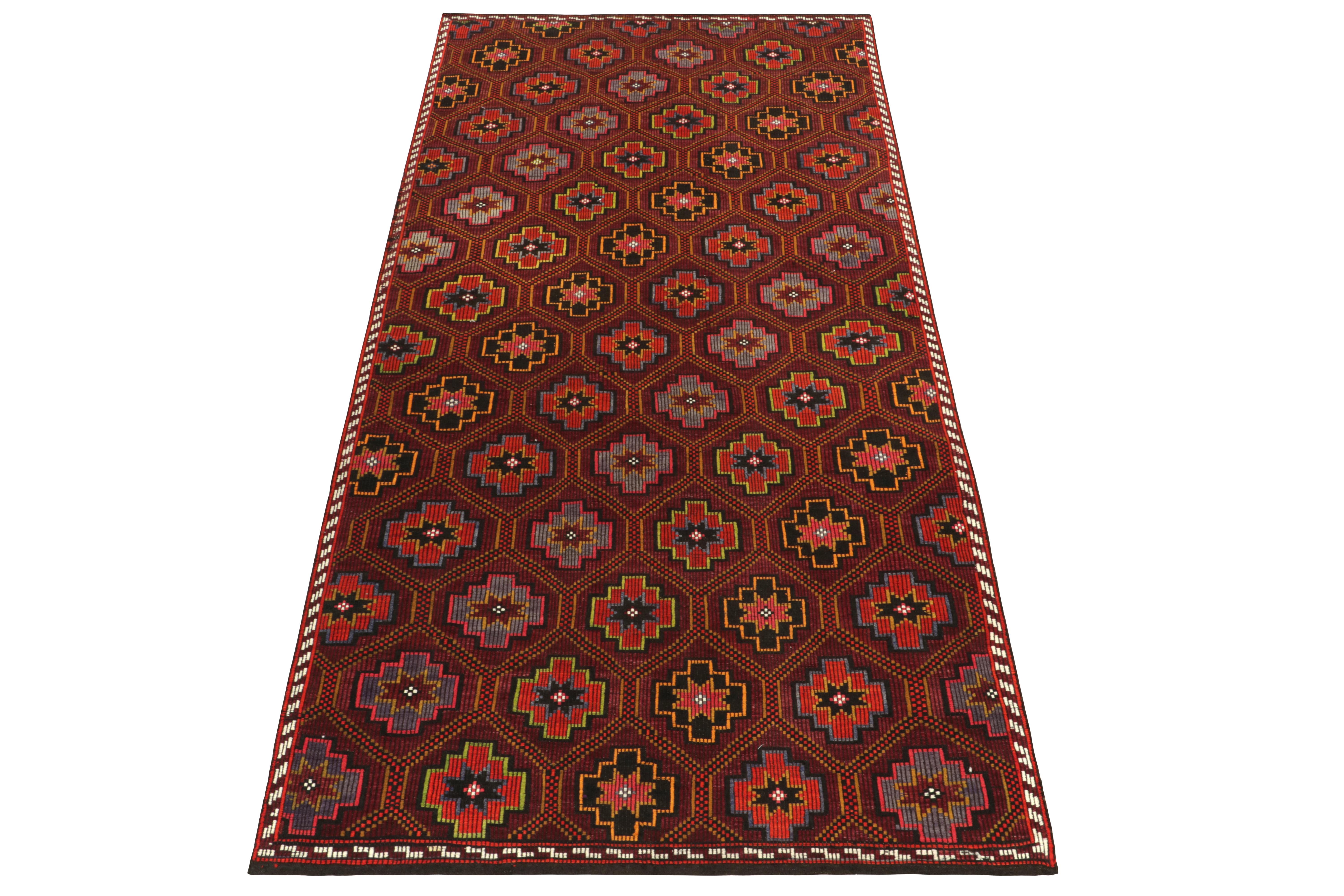 Among the celebrated vintage styles, this 6x12 Chaput kilim rug enjoys a special place in our flatweave collection. This particular handwoven rug from Turkey enjoys impeccable embroidery & detailing in rich red, gold & beige-brown with deep blacks