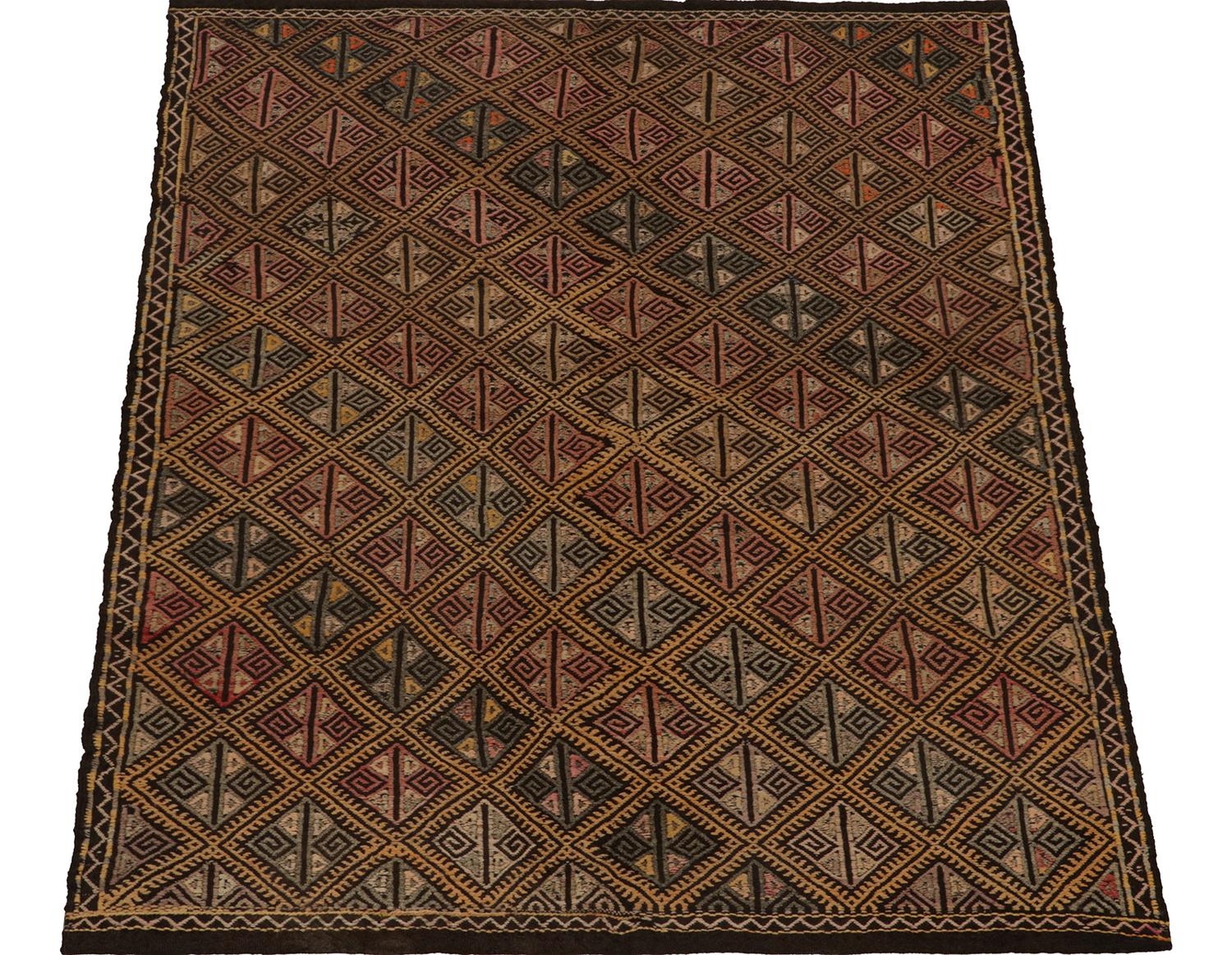 Turkish Vintage Chaput Tribal Kilim with Pink and Gold Geometric Pattern by Rug & Kilim For Sale