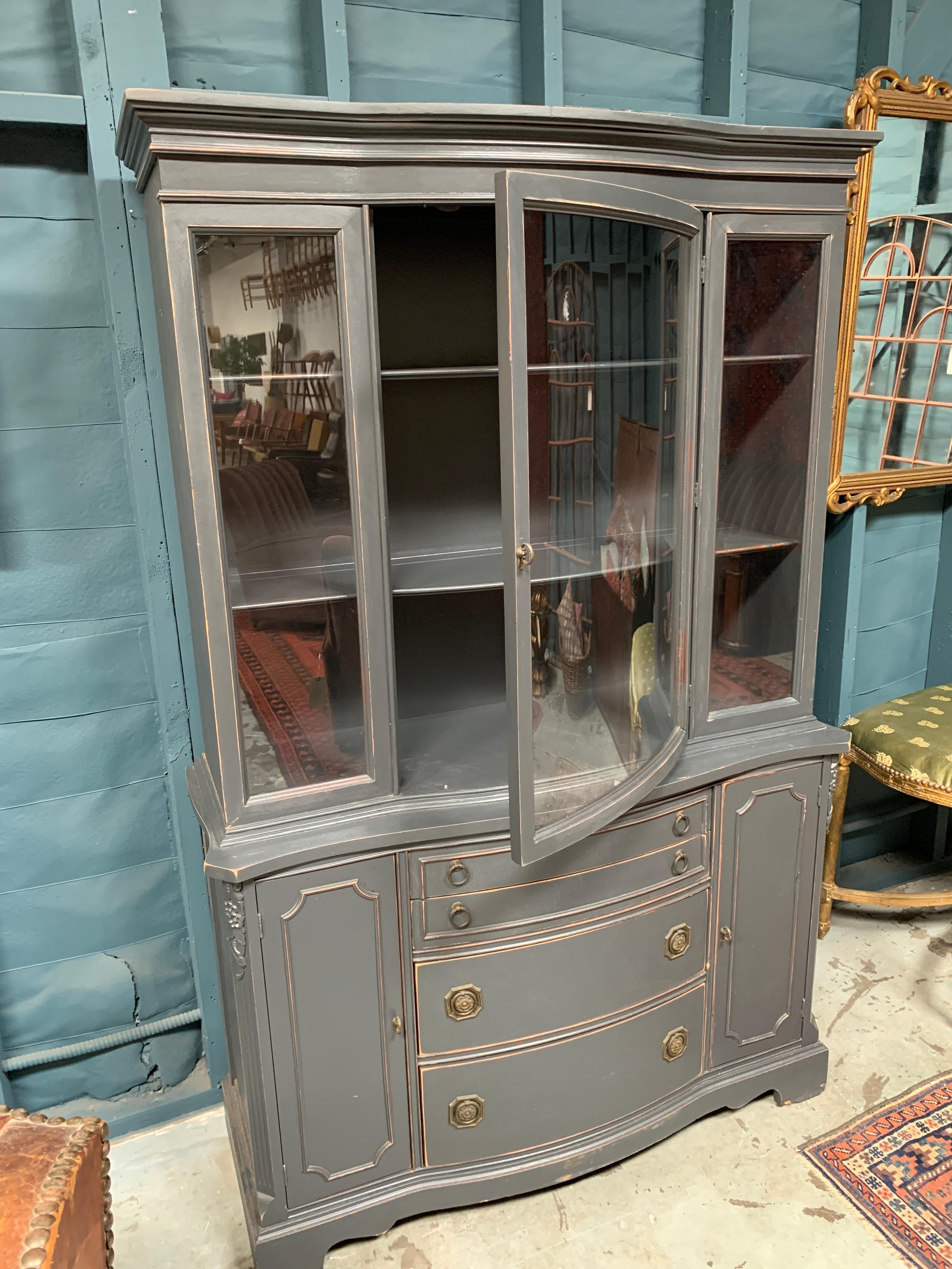 Large hutch with glass cabinet top, 2 thin drawers and 2 large drawers.