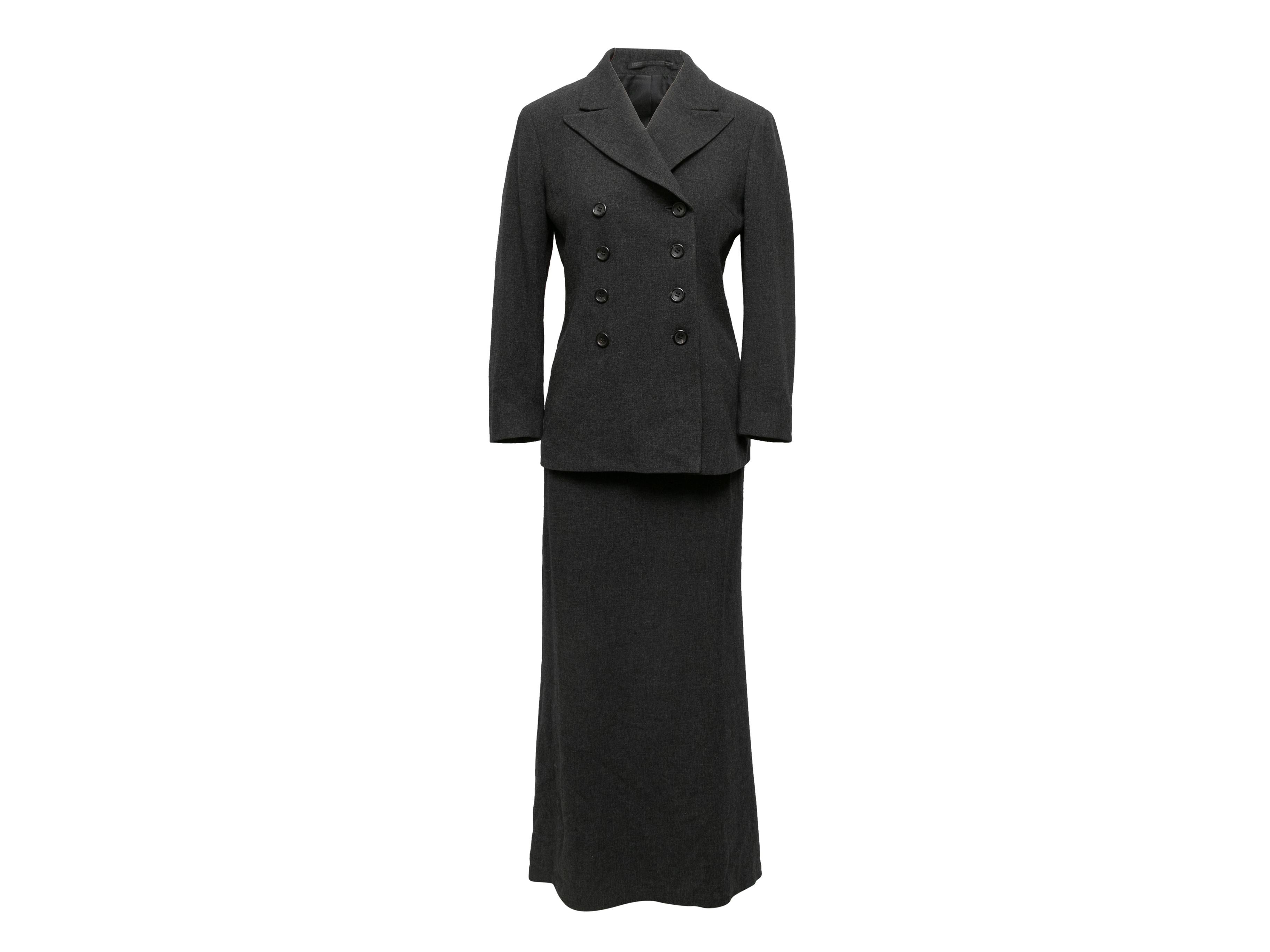 Abito con maxi gonna in lana antracite vintage di Yohji Yamamoto Noir. Il blazer è caratterizzato da rever a lancia e chiusura a doppio petto con bottoni. La gonna presenta una chiusura a zip. Blazer- 30