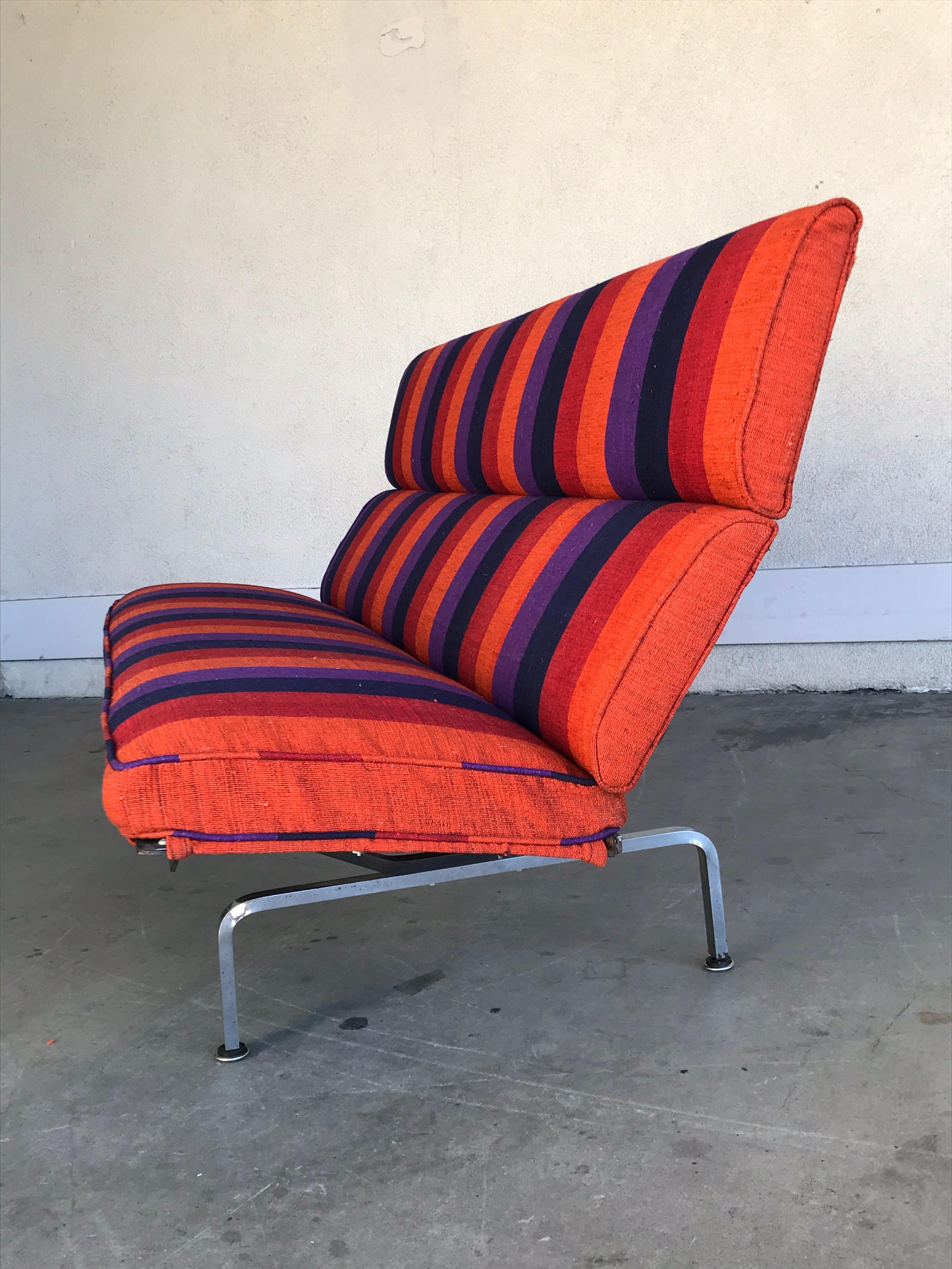 A classic Mid-Century Modern design.
It has been reupholstered with a dead-stock Alexander Girard Fabric from 1961.
The steel frame and plated steel base have minor wear and patina consistent with age and use, with original screws too.
The foot