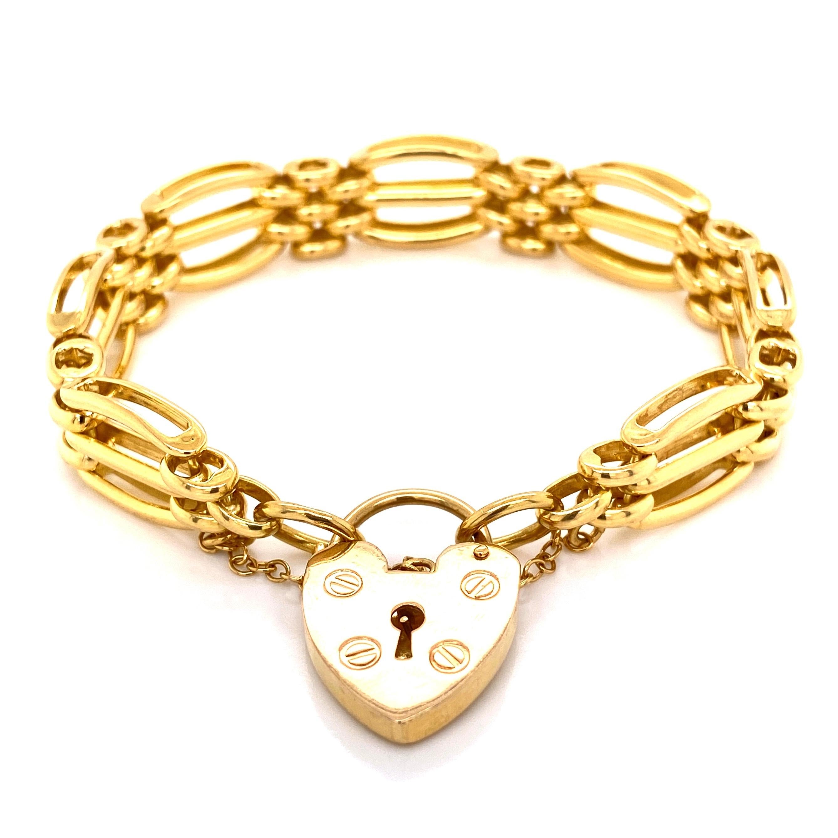 Simply Beautiful Vintage British Design! Hand crafted 18K Yellow Gold Link Bracelet with Padlock closure clasp by Charles Green & Son Ltd. U.K. United Kingdom. Marked: CG&S. Hallmark corresponds to: Birmingham, England. Classic and Chic…Yours to