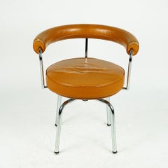 Vintage Charlotte Perriand LC7 Cognac Leather and Chrome Swivel Chair by Cassina