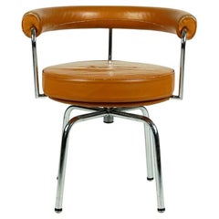 Vintage Charlotte Perriand LC7 Cognac Leather and Chrome Swivel Chair by Cassina