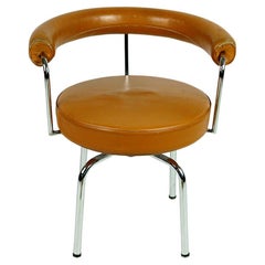 Vintage Charlotte Perriand LC7 Cognac Leather and Chrome Swivel Chair