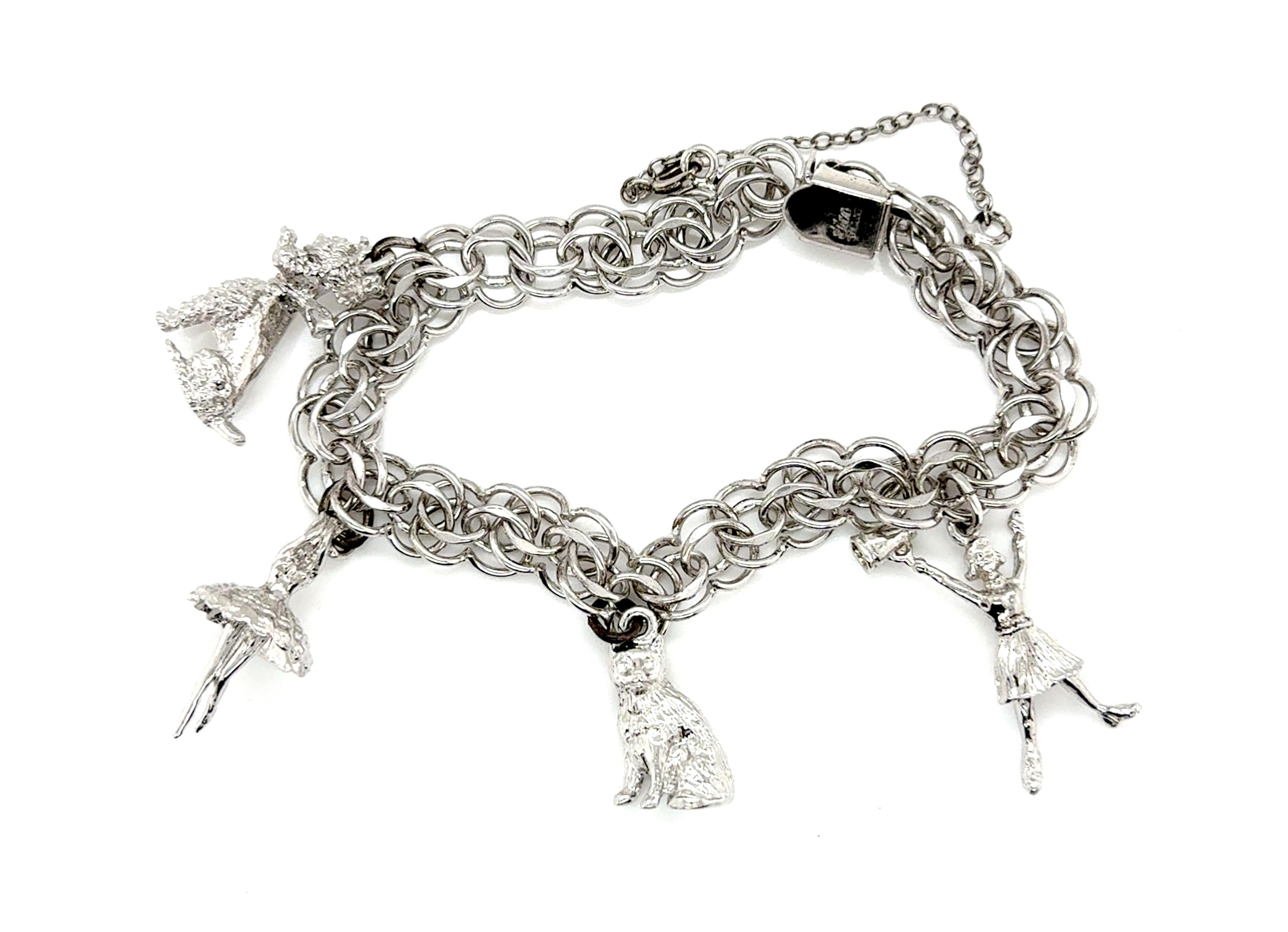 Vintage Charm Bracelet Sterling Silver Elco Cat Dog Ballerina Cheerleader


85% d'une once d'argent

Les charms représentent un chat, un chien, une ballerine et une pom-pom girl.

Le bracelet vient de chez Elco

La chaîne de sécurité maintient le