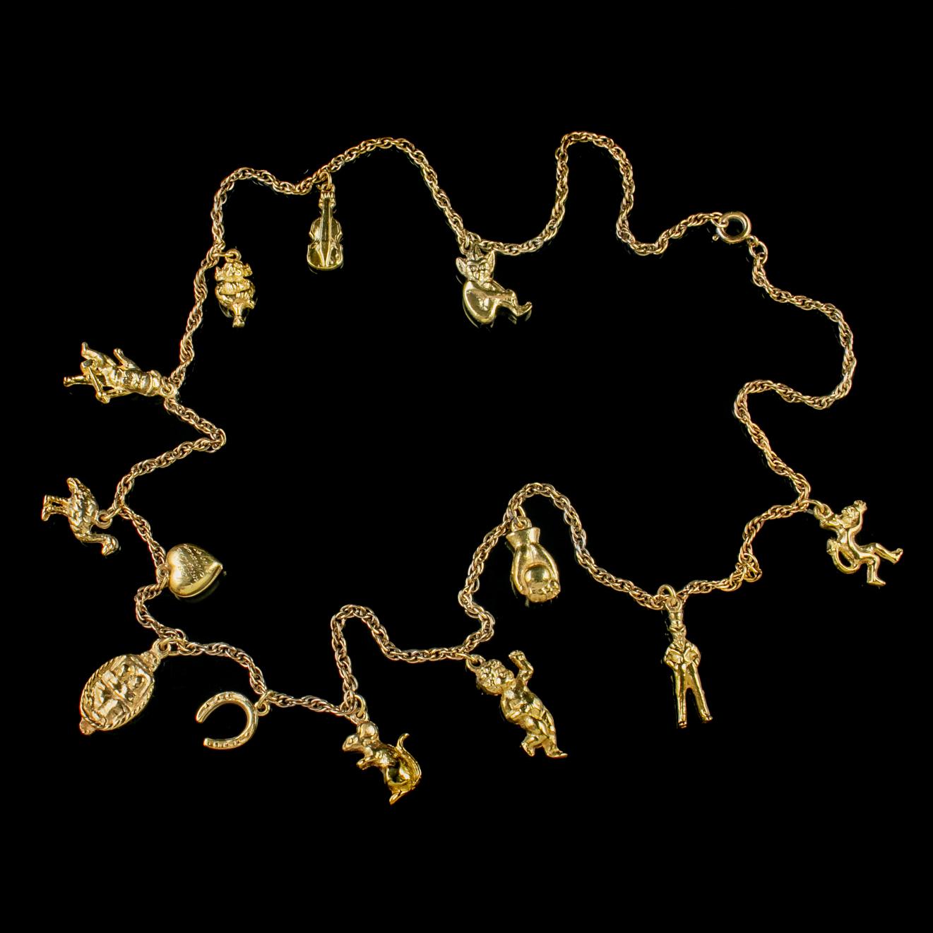 Women's Vintage Charm Necklace 18 Carat Gold Gilt Silver Chain, circa 1947 For Sale