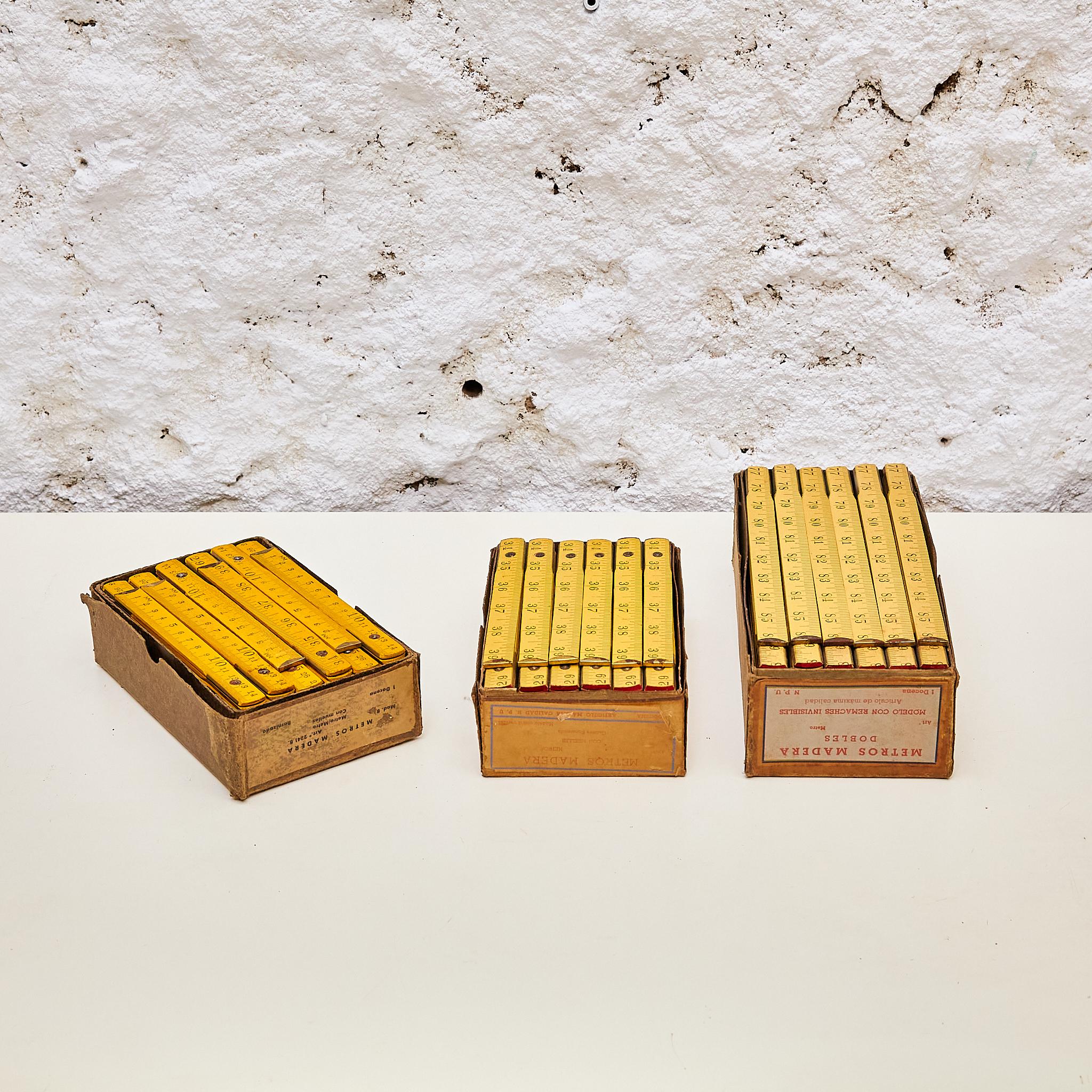 Mid-Century Modern Vintage Charm: Set of 36 Antique Wooden Measuring Tapes with Boxes, Circa 1940 For Sale