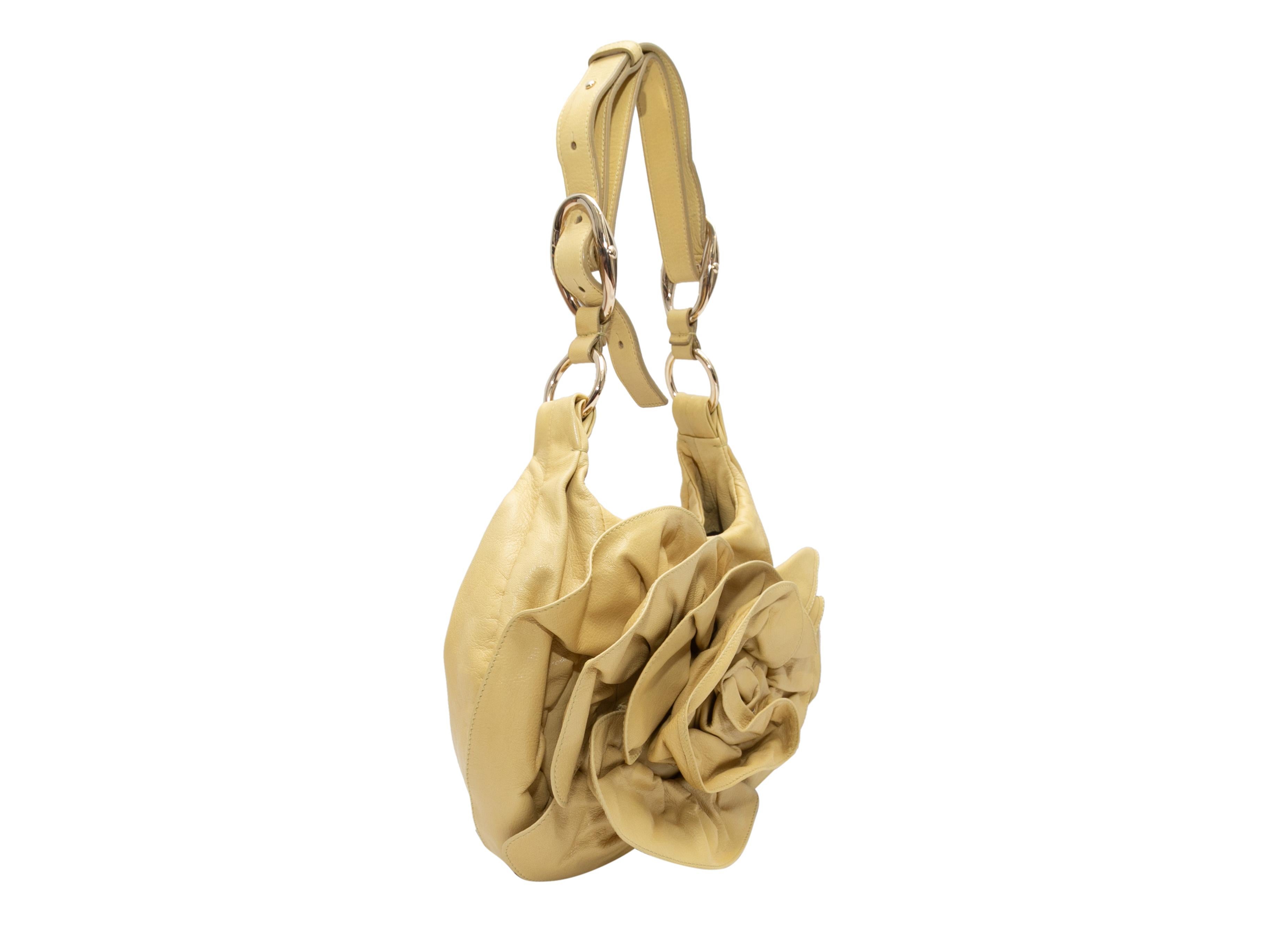 Vintage Chartreuse Yves Saint Laurent Nadja Floral Shoulder Bag. Circa 2003. The Nadja Floral Shoulder Bag features a leather body, gold-tone hardware, a single shoulder strap, and a top closure. 13