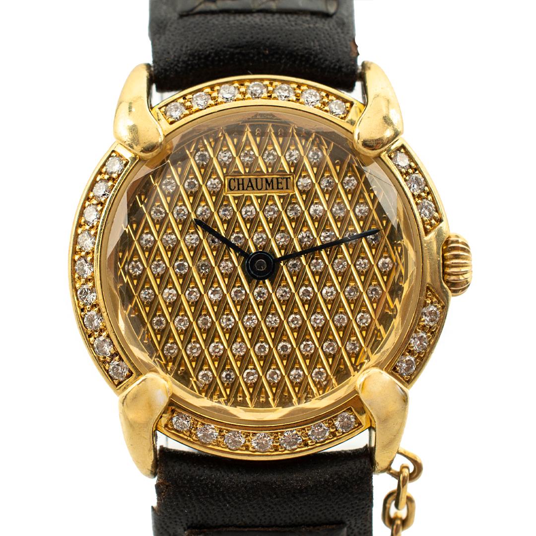 Ladies diamond french made wristwatch. The watch weighs a total of 28.78 grams. Engraved with 