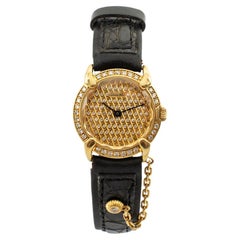 Chaumet Paris Montre vintage en or jaune 18 carats et diamants pour femmes