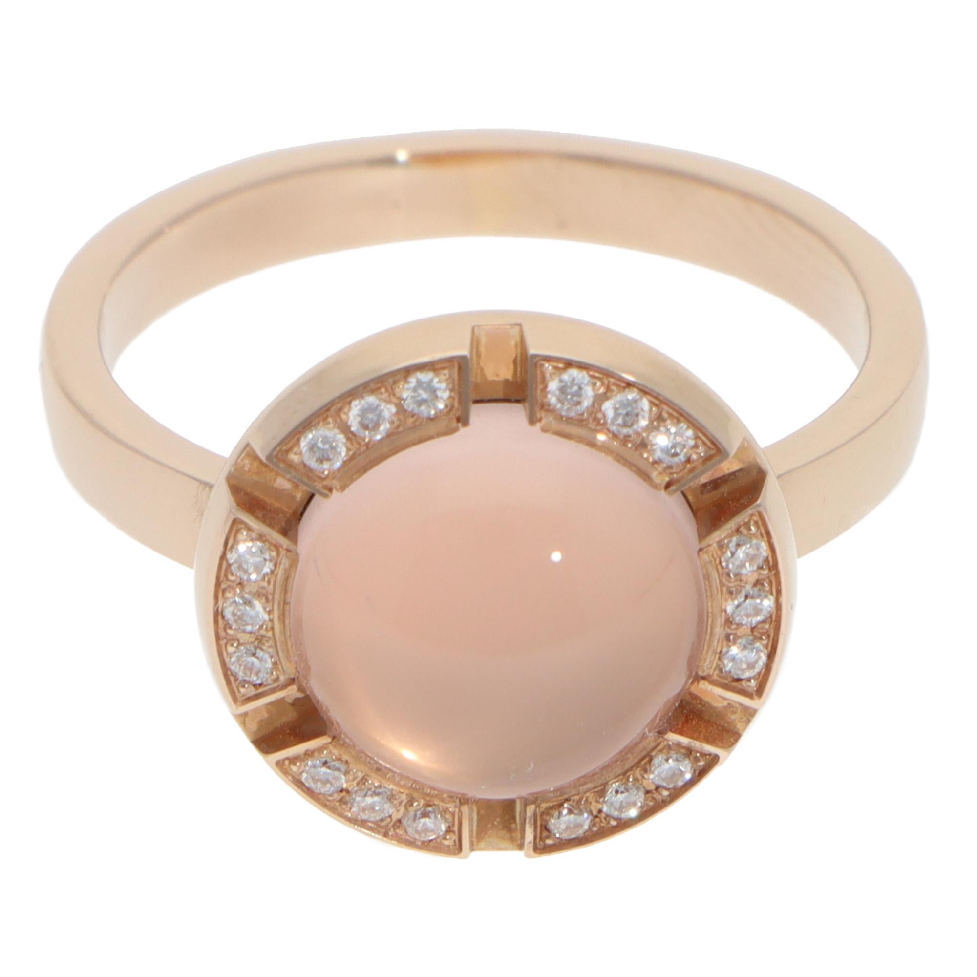 A beautiful vintage Chaumet rose quartz and diamond Class One Croisière ring set in 18k rose gold.

From the iconic Class One Croisière collection, the ring is predominately set with a pink round cabochon rose quartz in a closed-back setting.