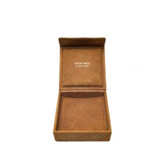 Boîte à bijoux ou à montres vintage en daim de la marque Chaumet