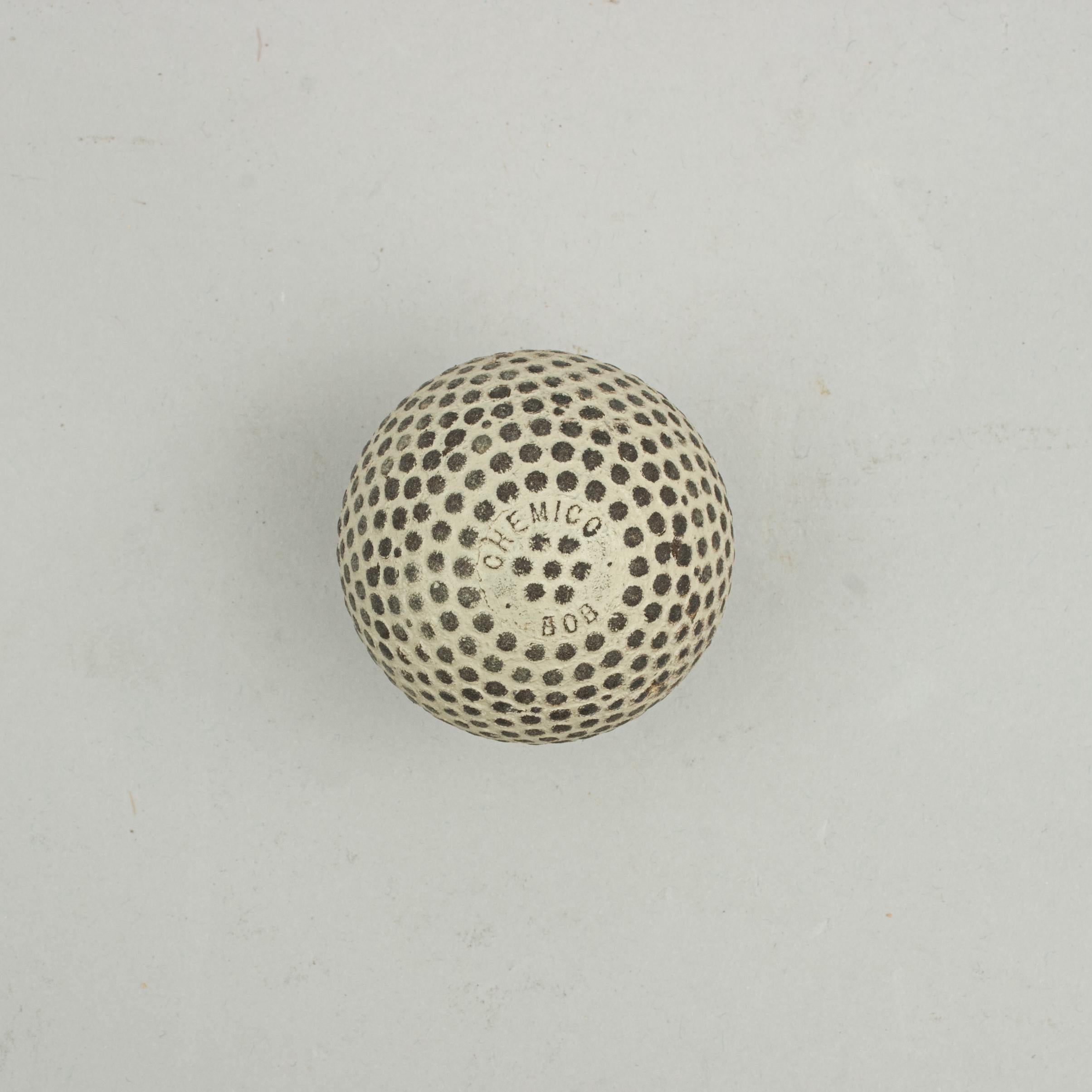 Bramble Pattern Golf Ball, Chemico Bob.
A good bramble patterned rubber core golf ball in used condition. The ball is marked 